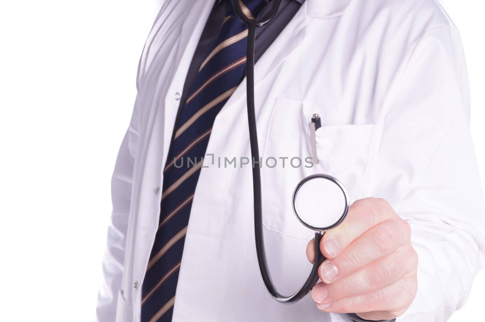 doctor with stethoscope in hand. Copy space and isolated