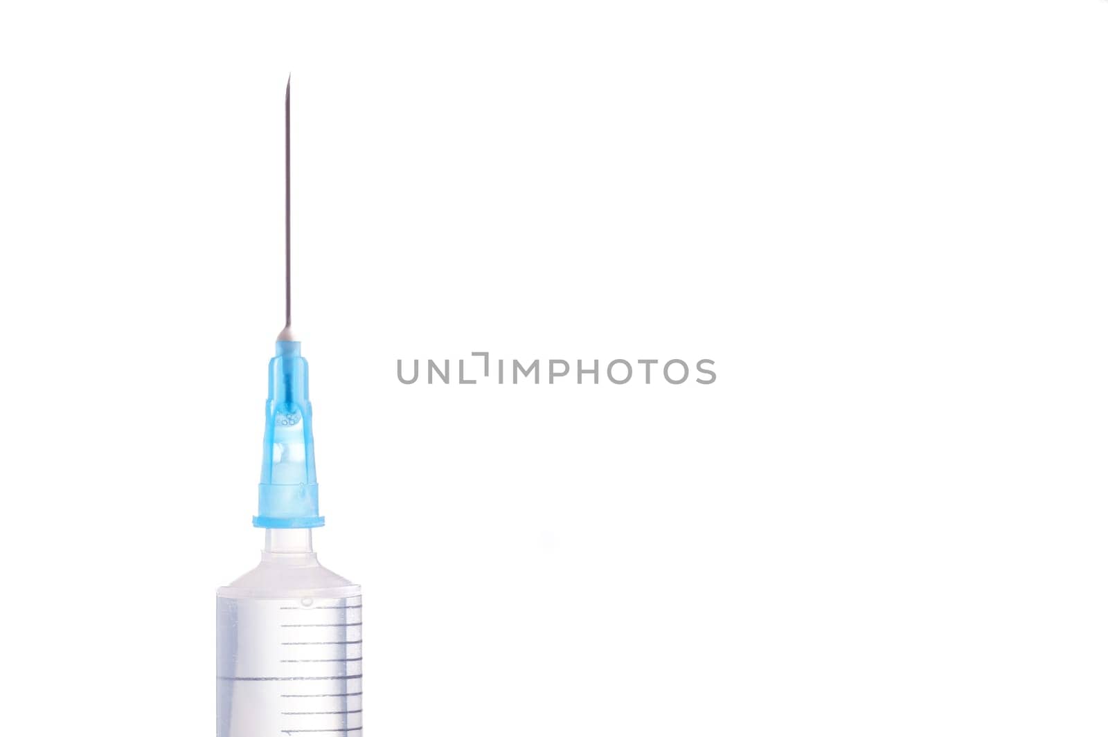 Syringe and needle filled with liquid, isolated on white