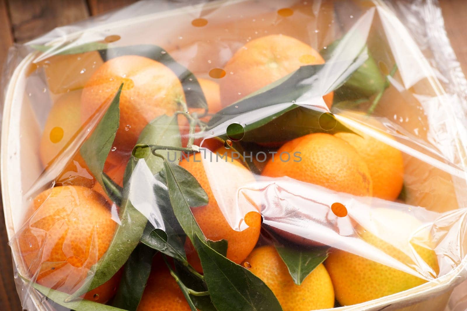 fresh organic clementines picked with green leaves
