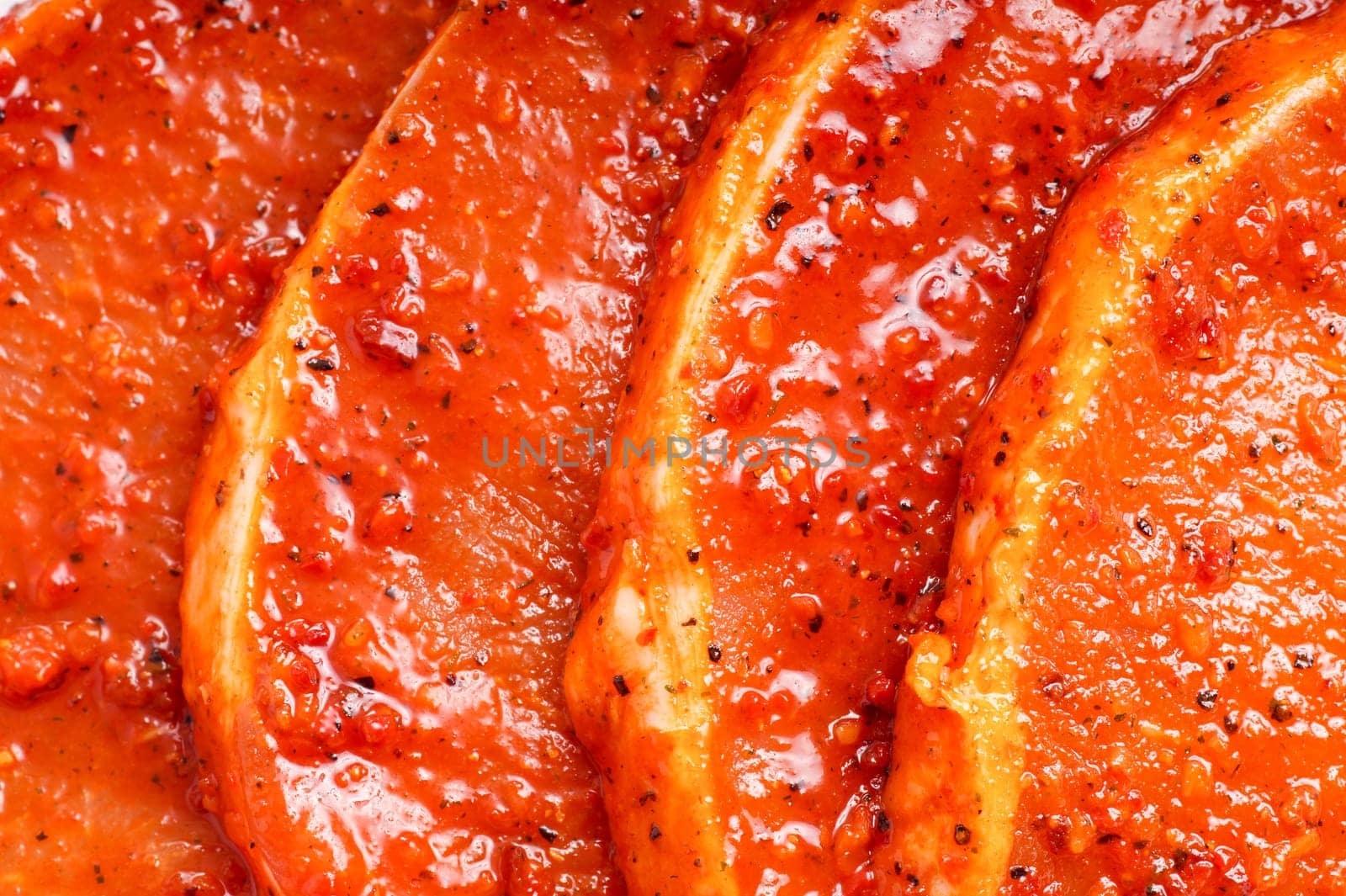 Raw marinated meat for bbq, pork chop