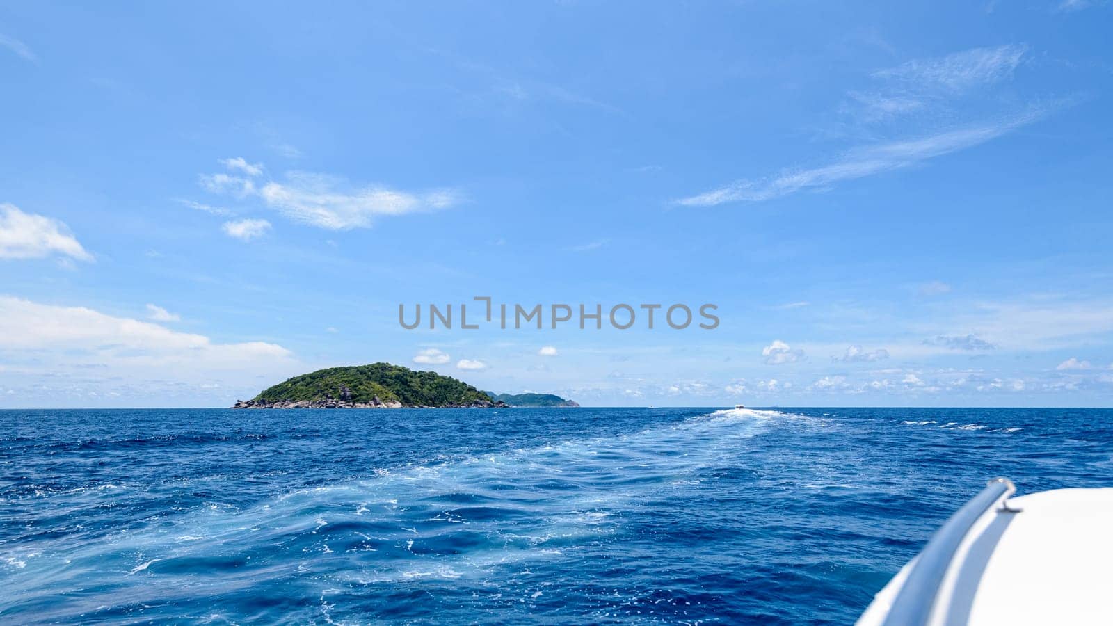 Travel by speed boat to islands in the beautiful landscape of blue sea and sky during summer at Mu Ko Similan National Park, Phang Nga province, Thailand, 16