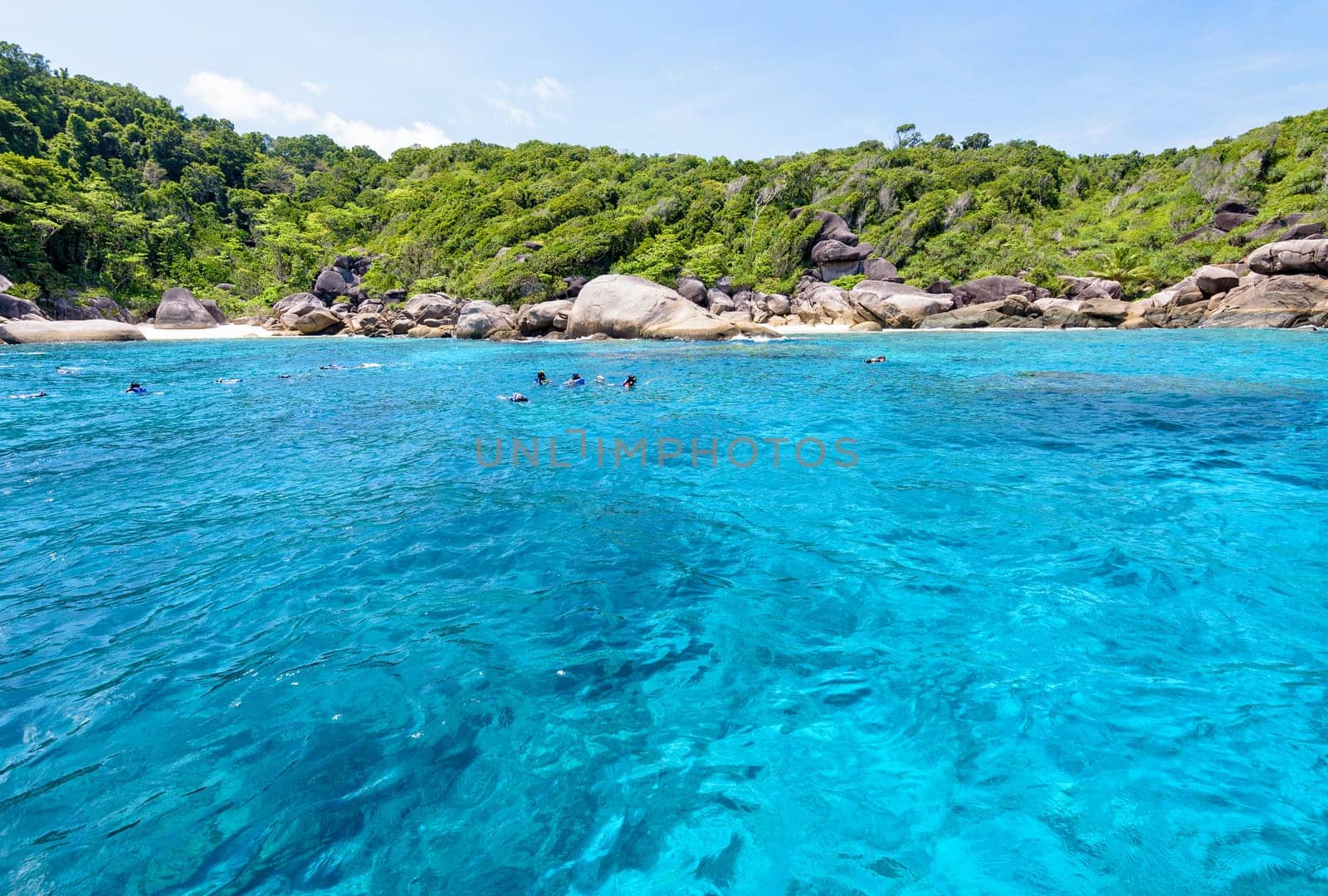 Tourists enjoyed snorkelling on blue sea and sky during summer at Ko Ba Ngu Island in Mu Ko Similan National Park, Phang Nga province, Thailand