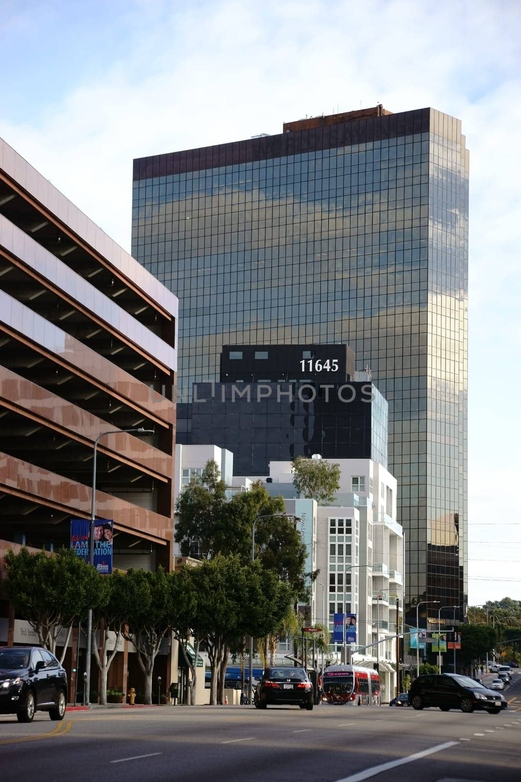 Los Angeles,United States - December 27,2015: The World Savings skyscraper and office buildings and shopping malls on Wilshire Boulevard with traffic on December 27,2015 in Los Angeles.