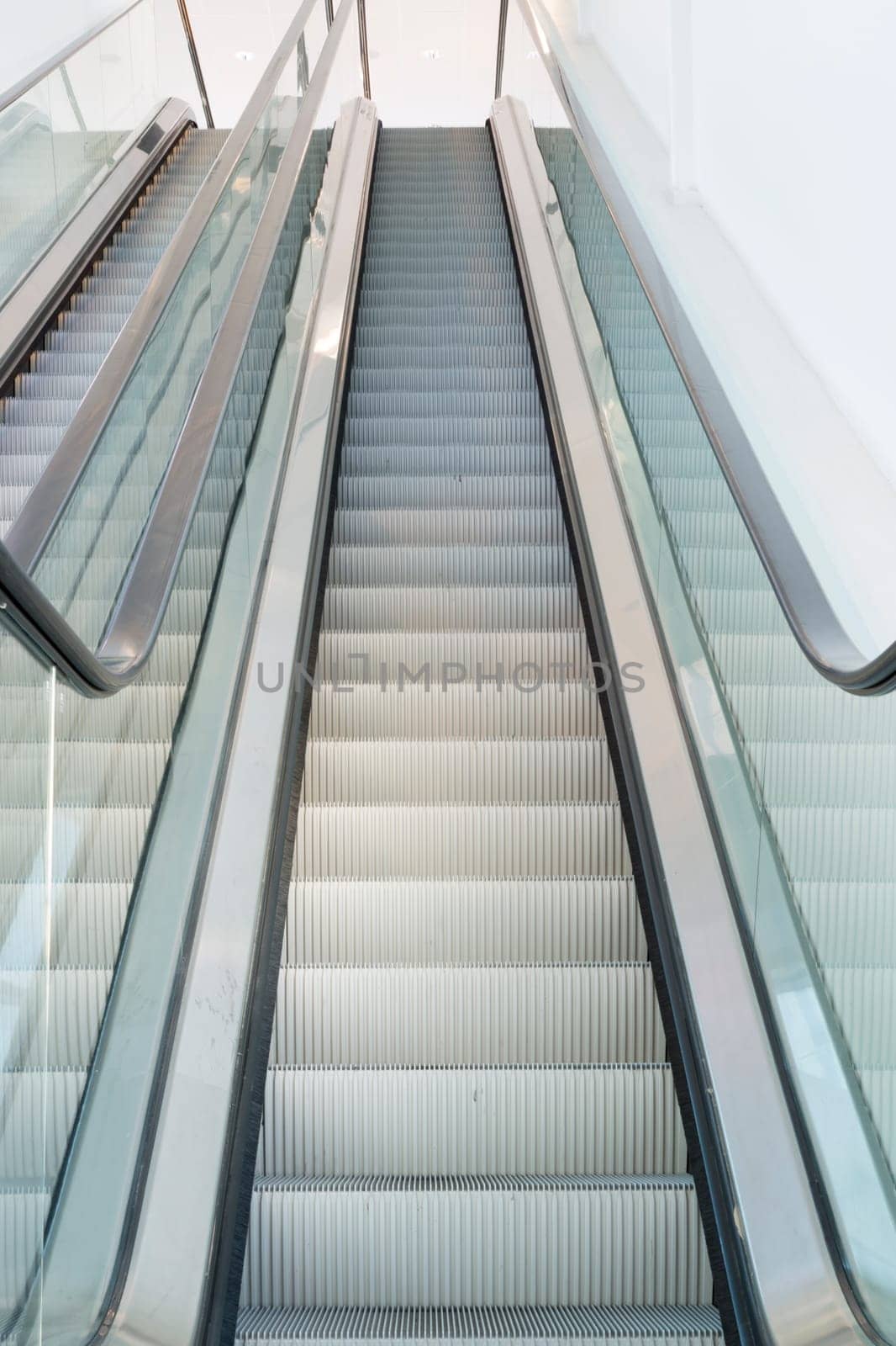 Pair of Escalators looking up.