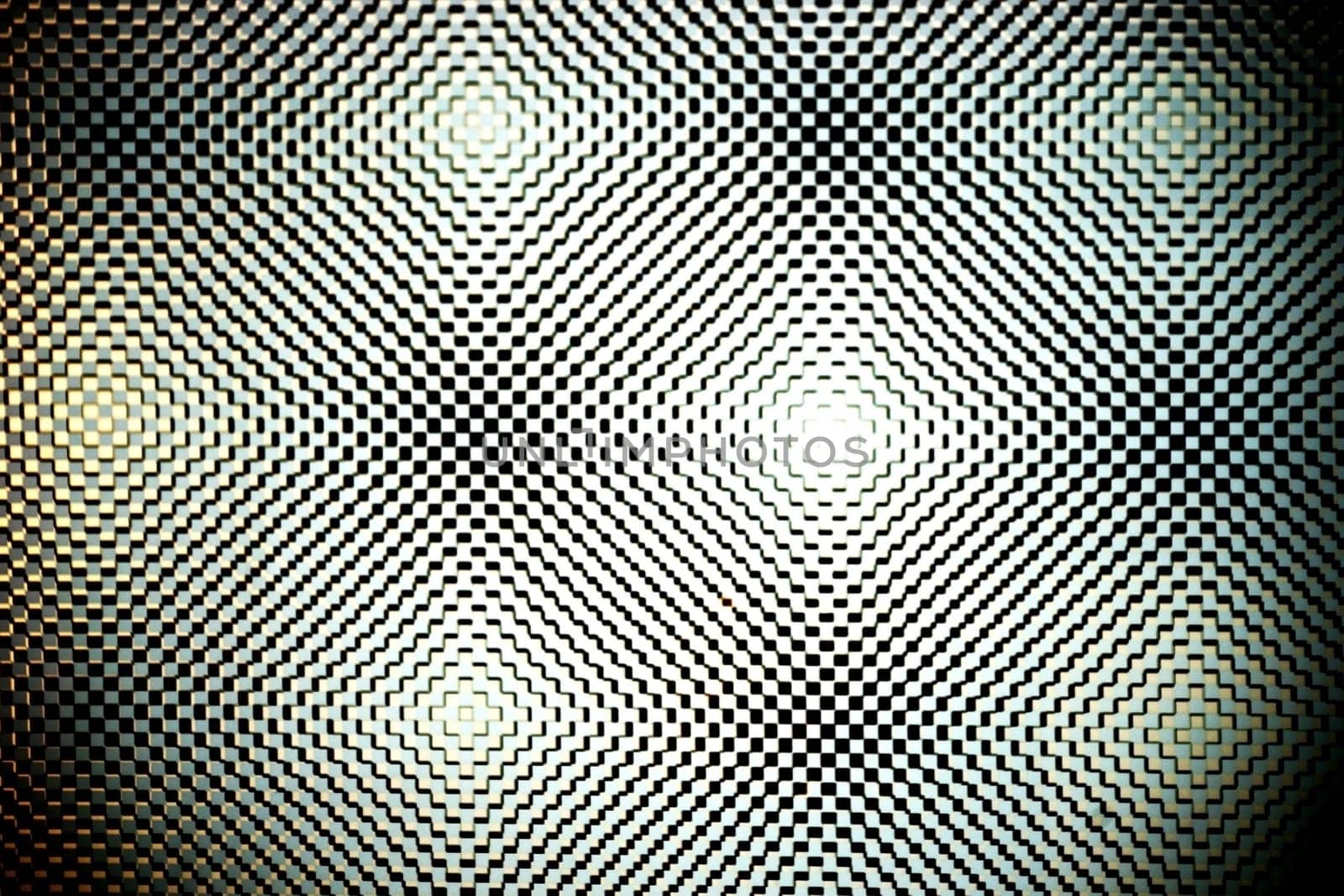 An abstract lyritoled metal surface of geometric shapes and figures.