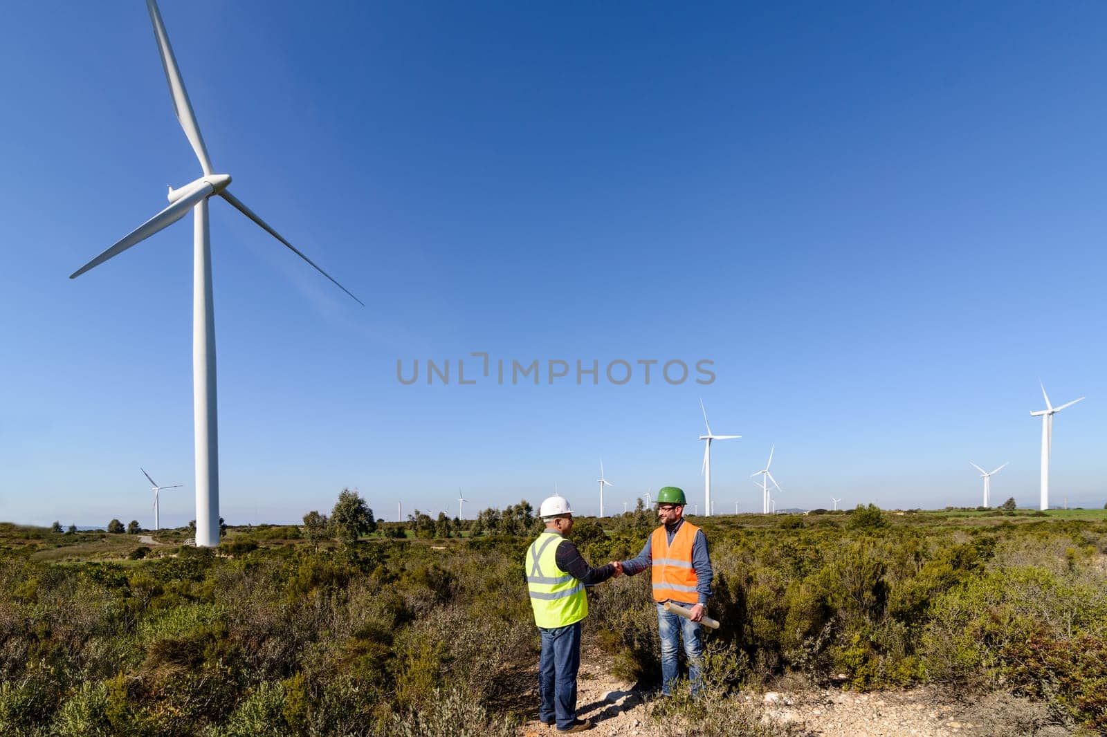 Engineers of wind turbine control projects and production.