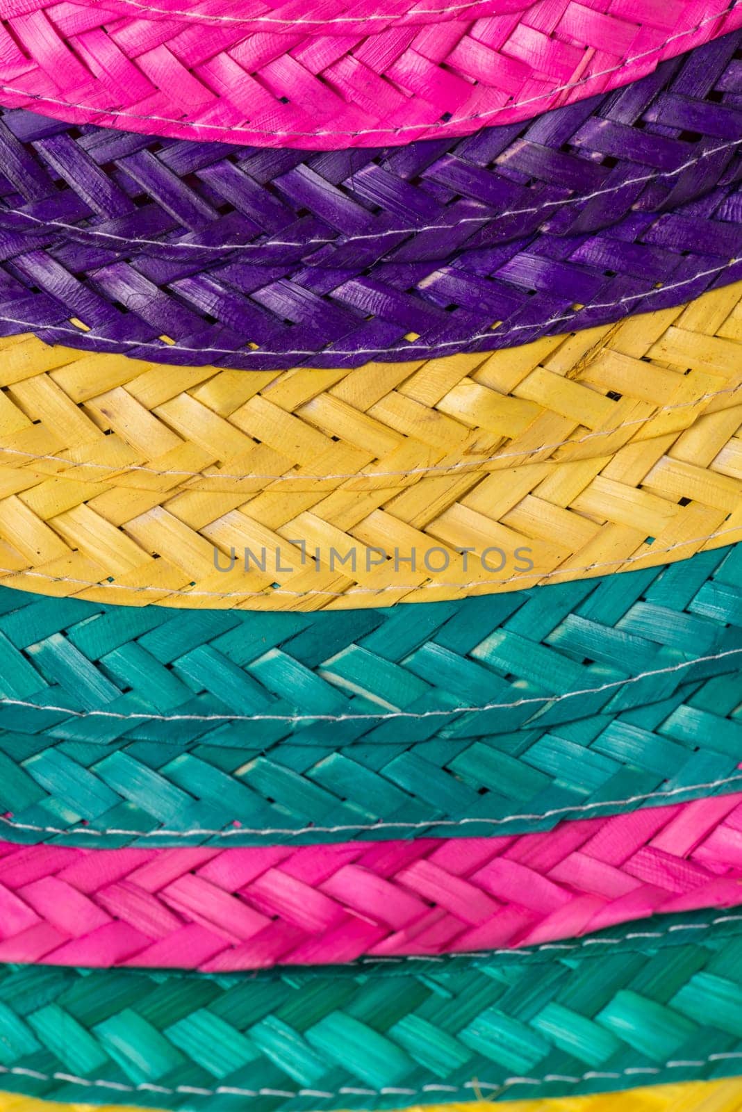 Abstract colorful background of woven straw.