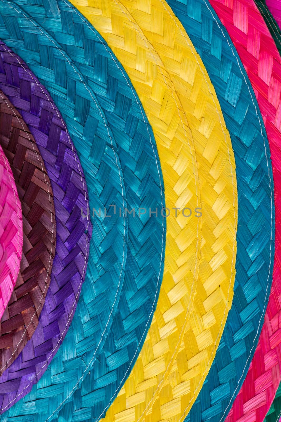 Abstract colorful background of woven straw.