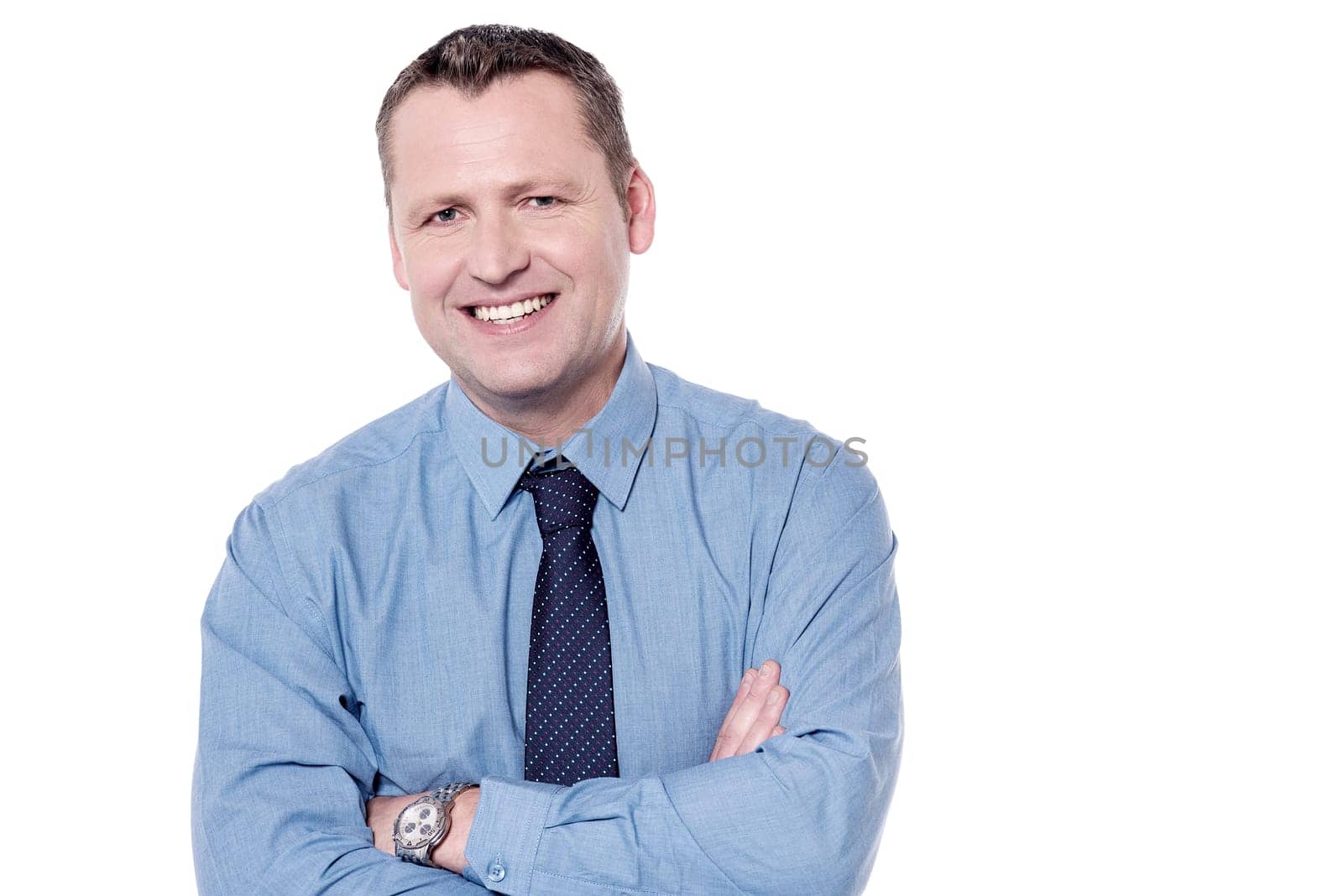 Smiling businessman isolated on white with  crossed arms
