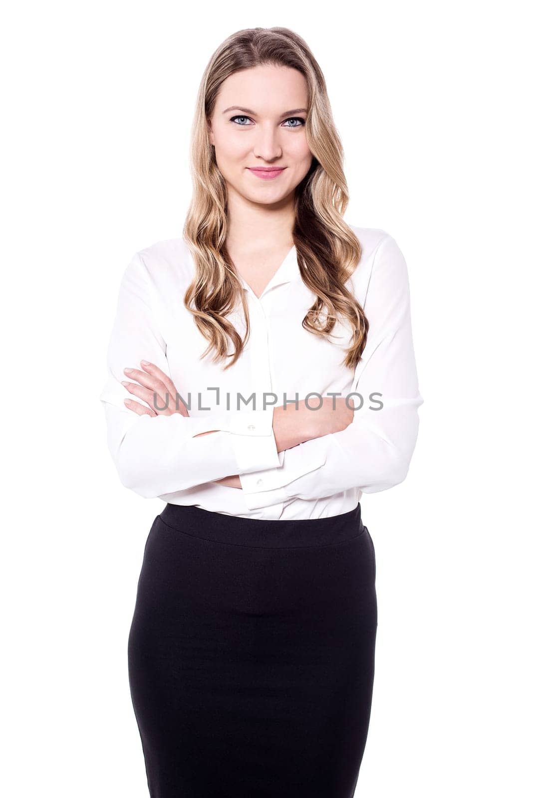 Professional woman posing over white with arms crossed