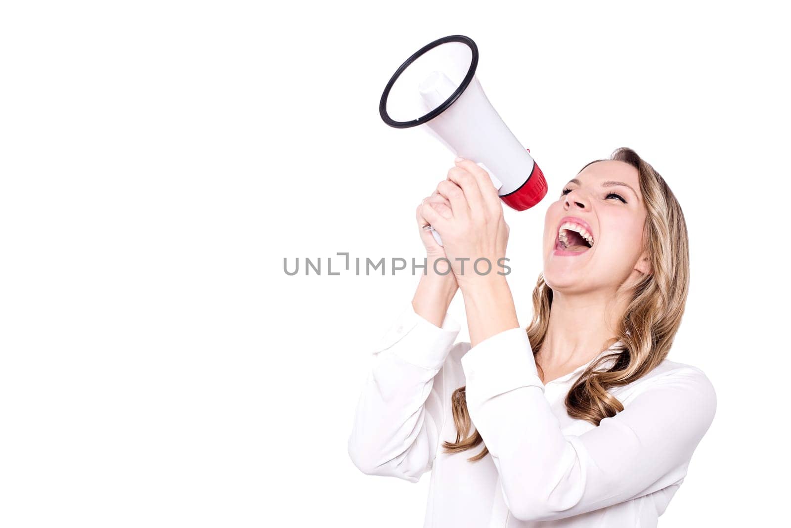 Woman screaming on a megaphone - isolated over white