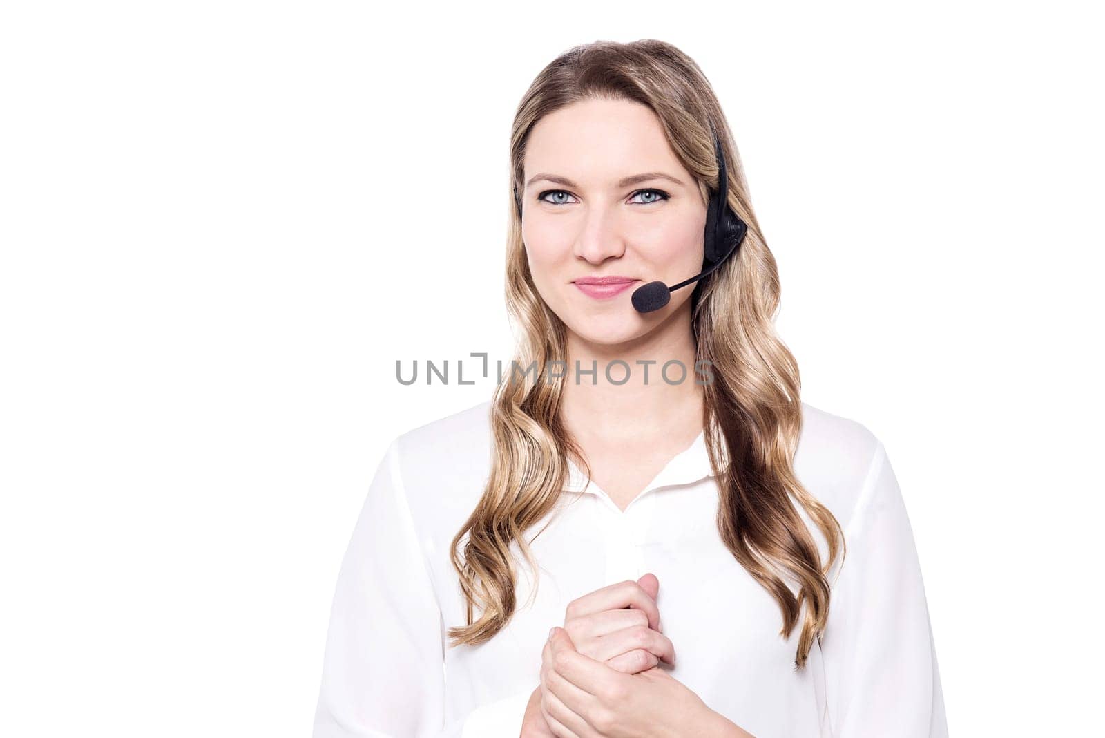 Beautiful smiling woman with headphones looking at camera