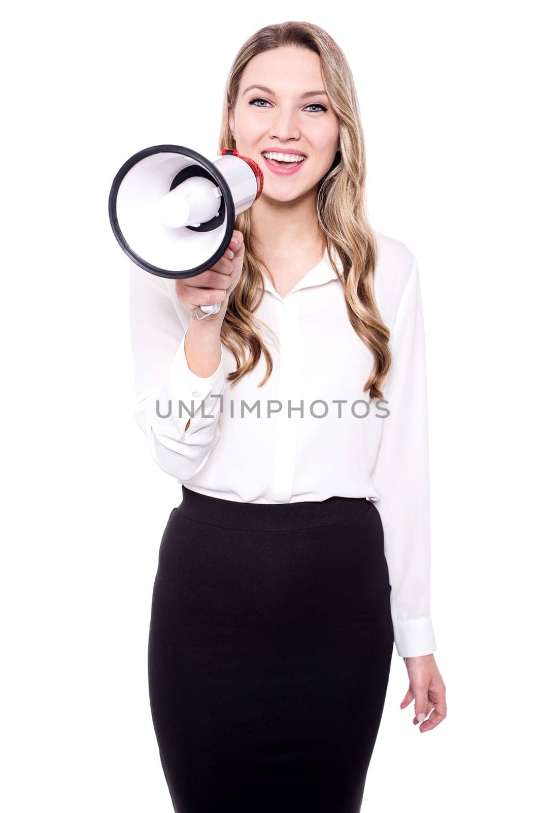 Pretty woman with a megaphone making an announcement