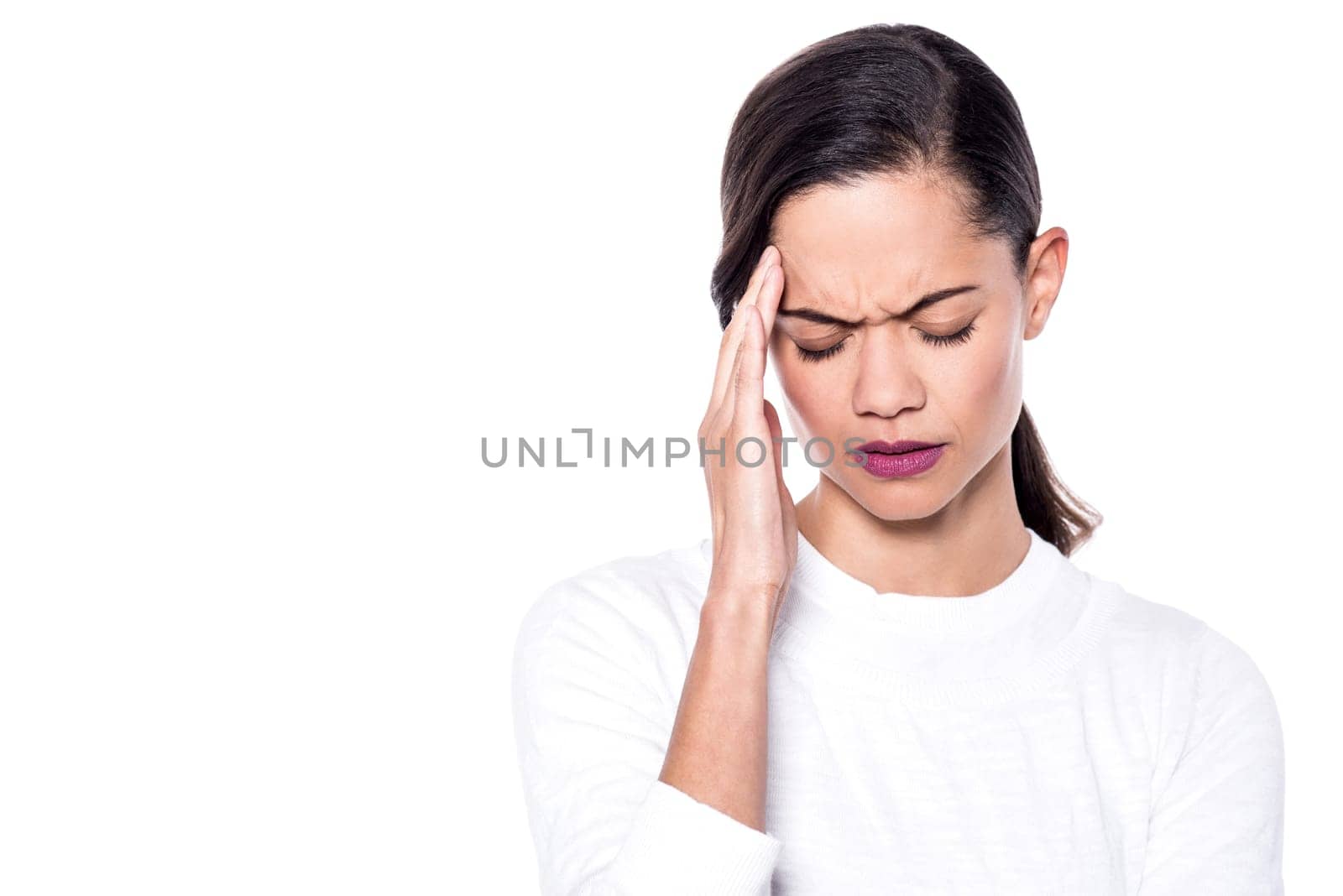 Depressed young lady with hand on head