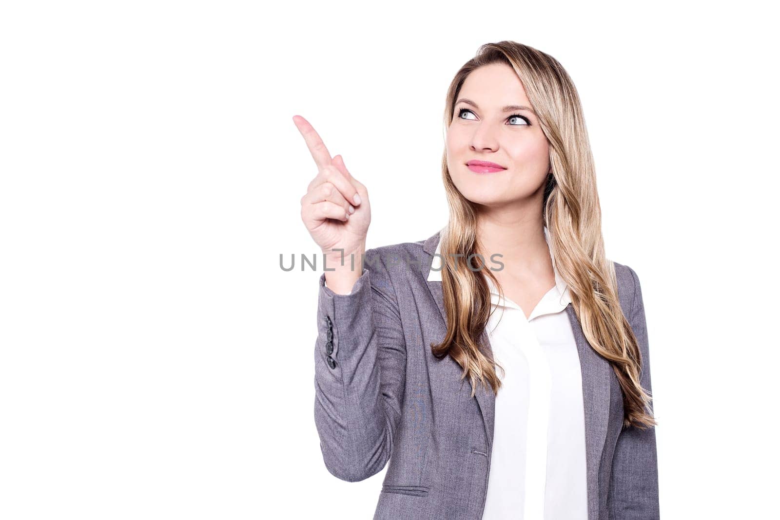Beautiful woman pointing away at something