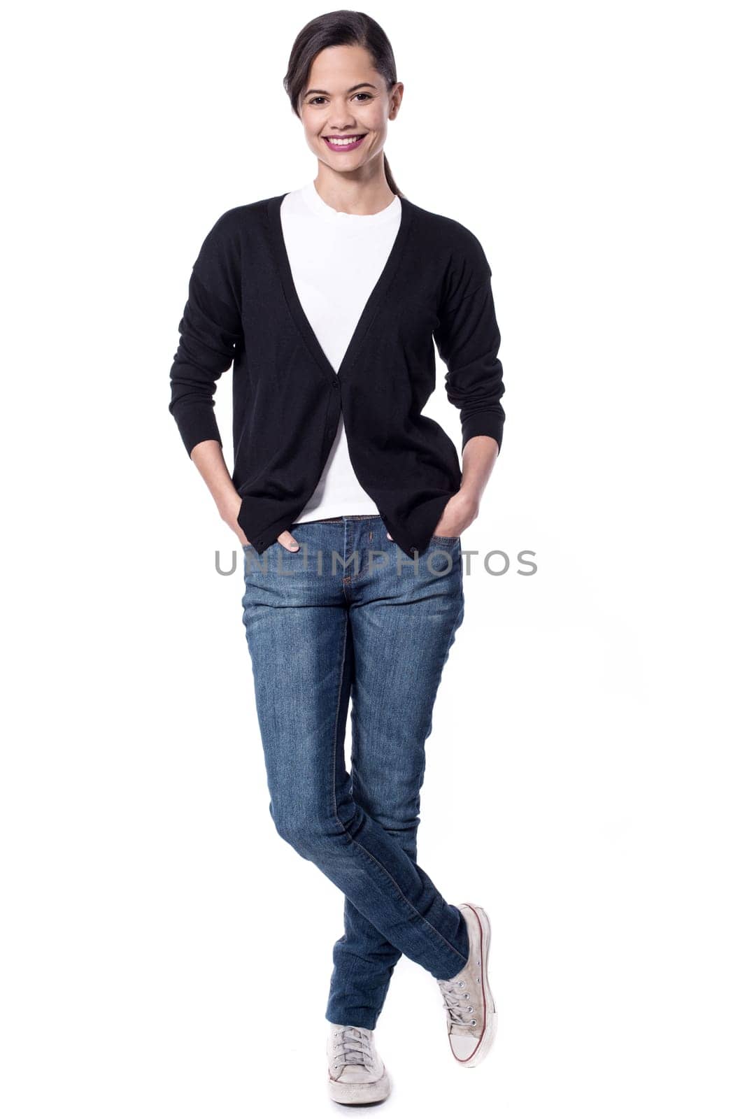 Stylish woman standing with crossed leg over white