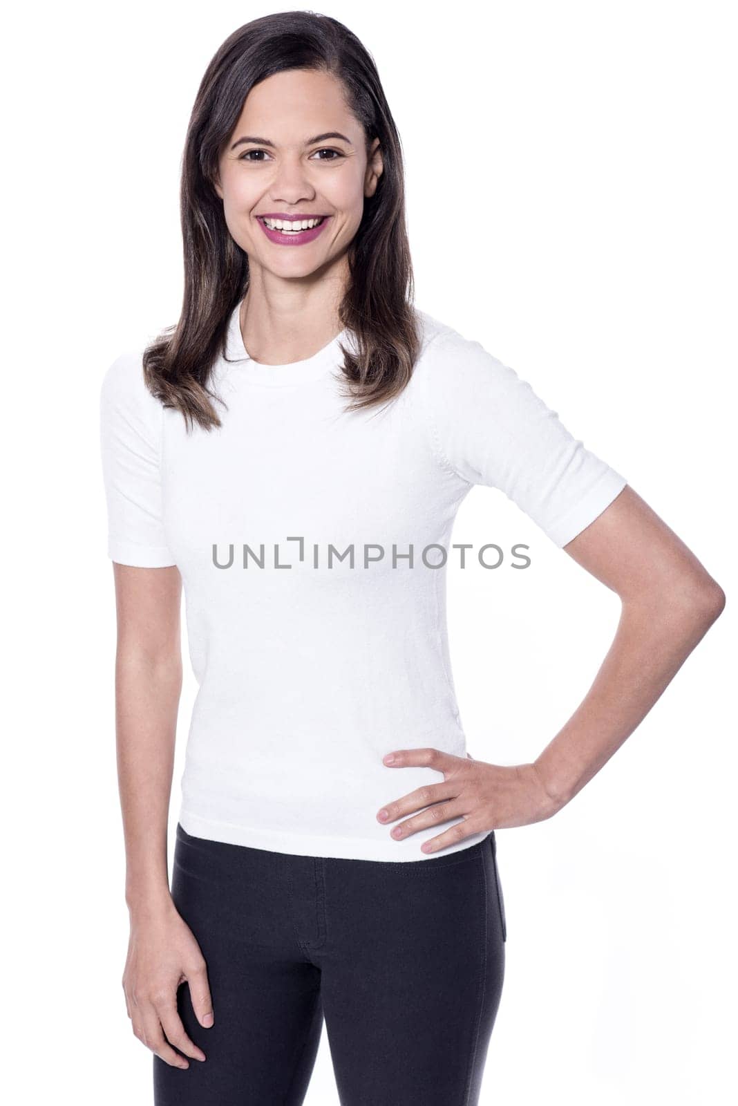 Pretty young girl posing with hand on waist