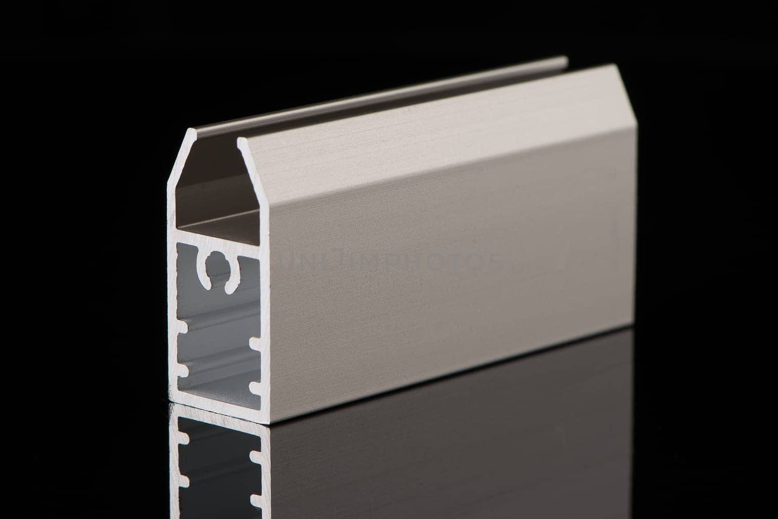Aluminium profile sample isolated on black background.