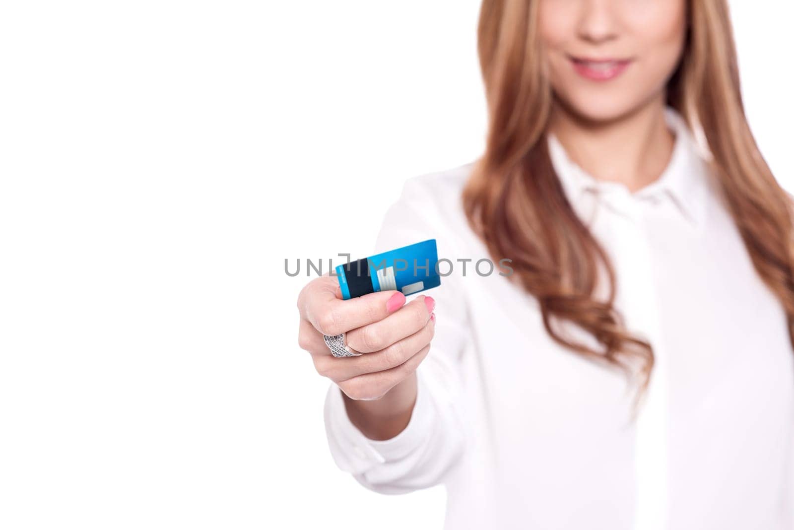 Cropped image of a pretty woman showing debit card