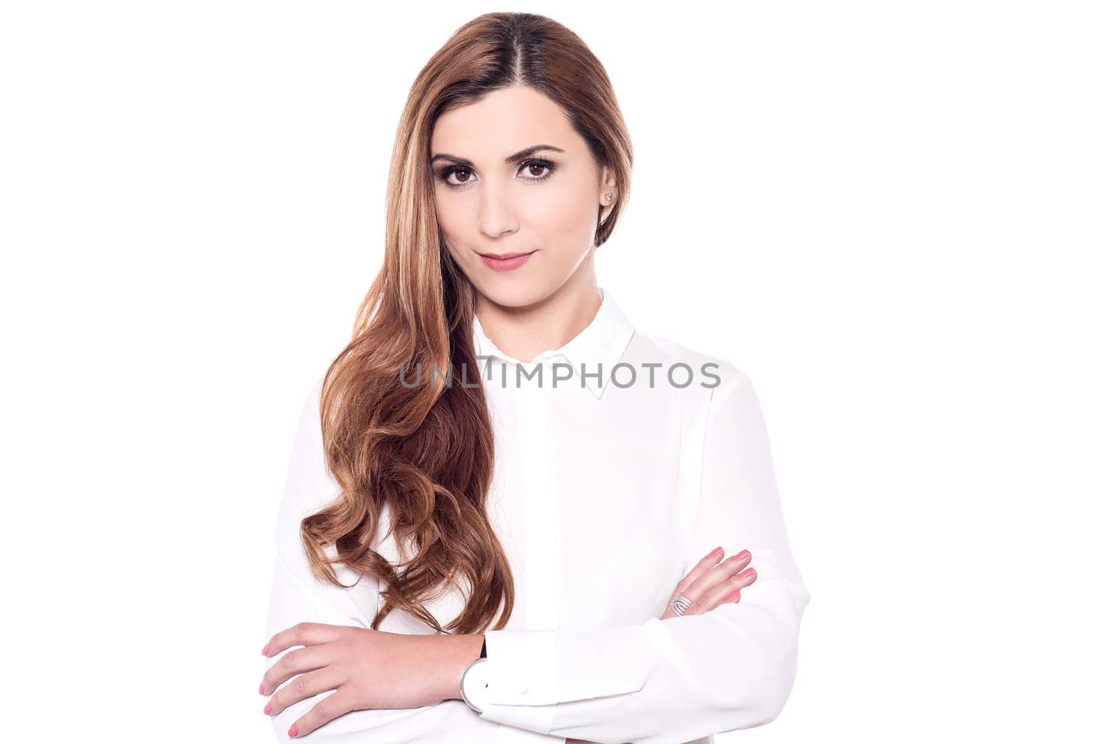 Attractive woman posing to camera with folded arms
