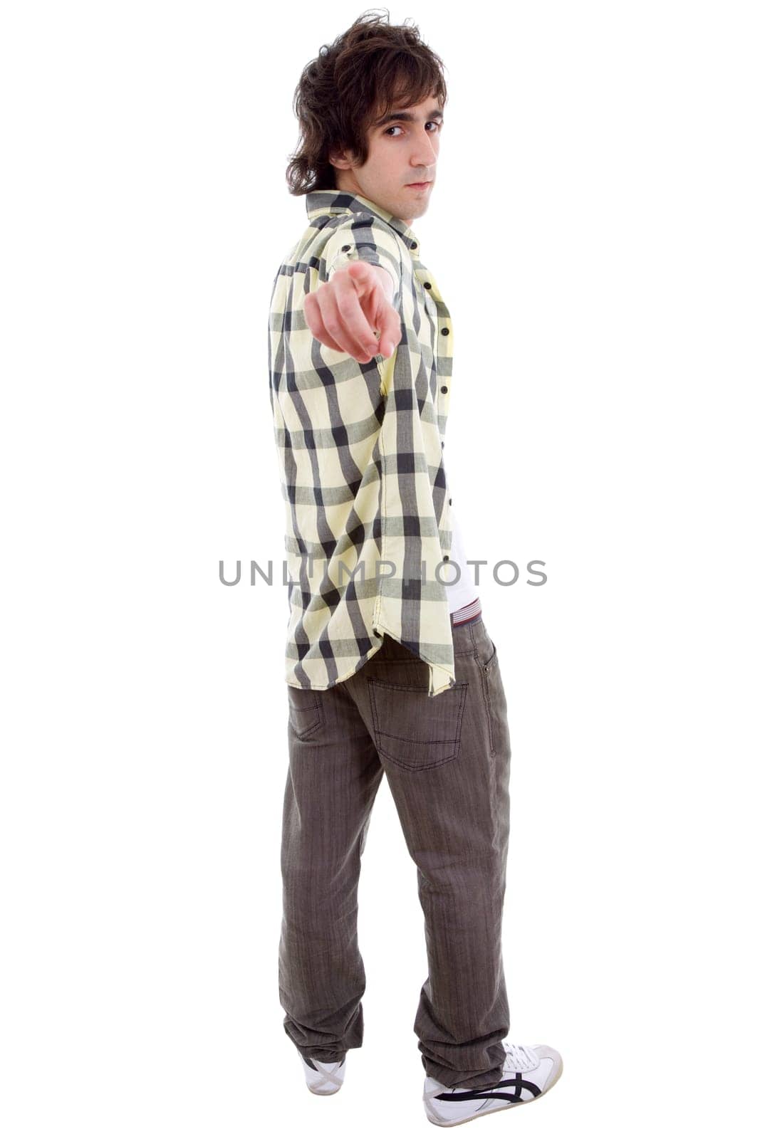casual young man full body, pointing, isolated on white