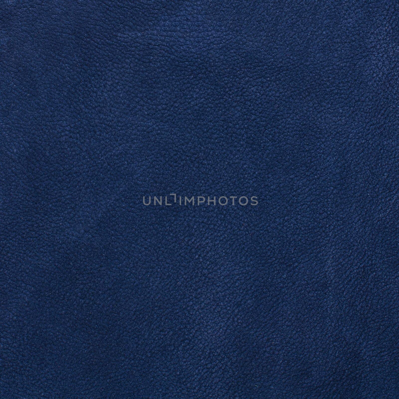 Blue leather texture closeup, useful as background