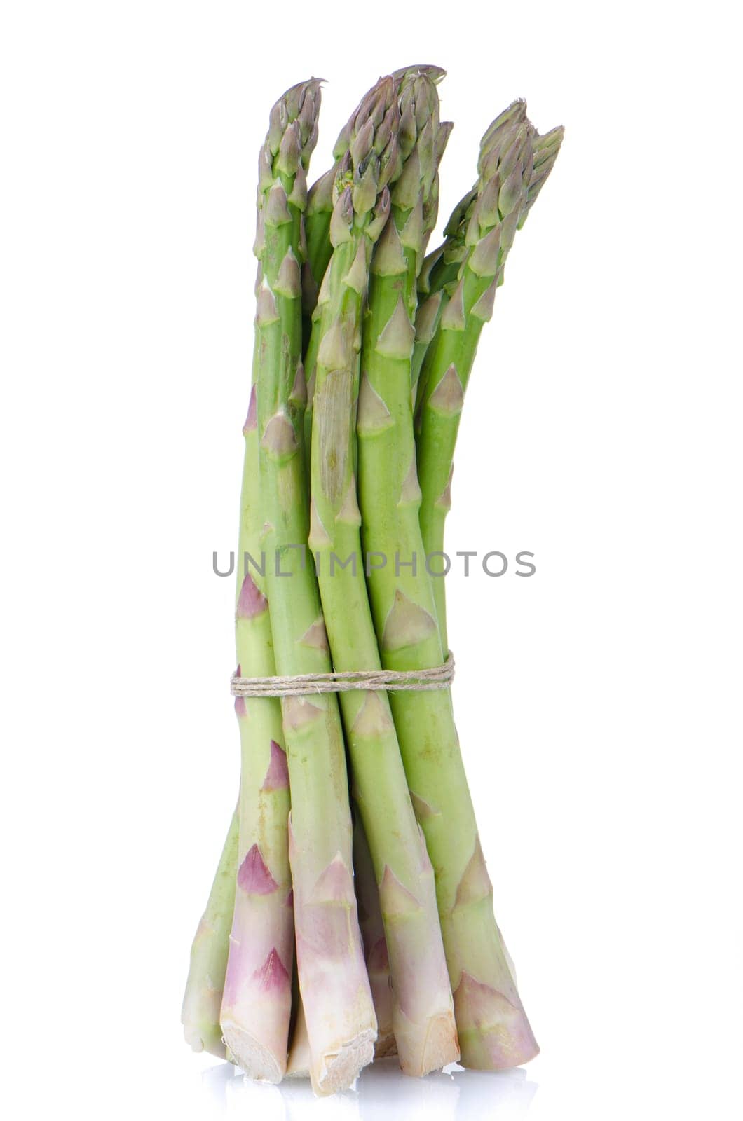 Fresh green asparagus isolated on white background