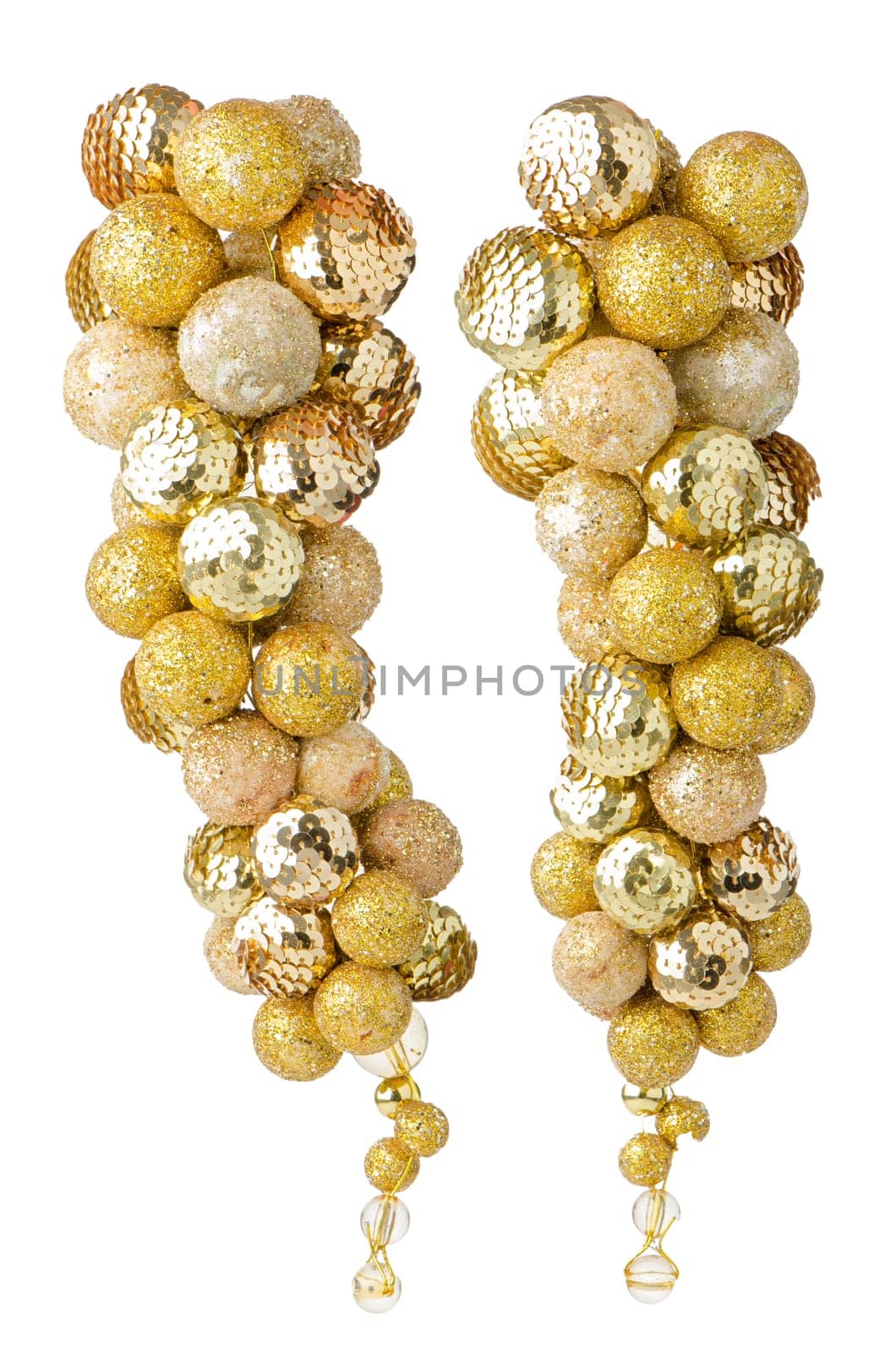 Christmas decoration simulating a bunch of golden grapes isolated on white background.