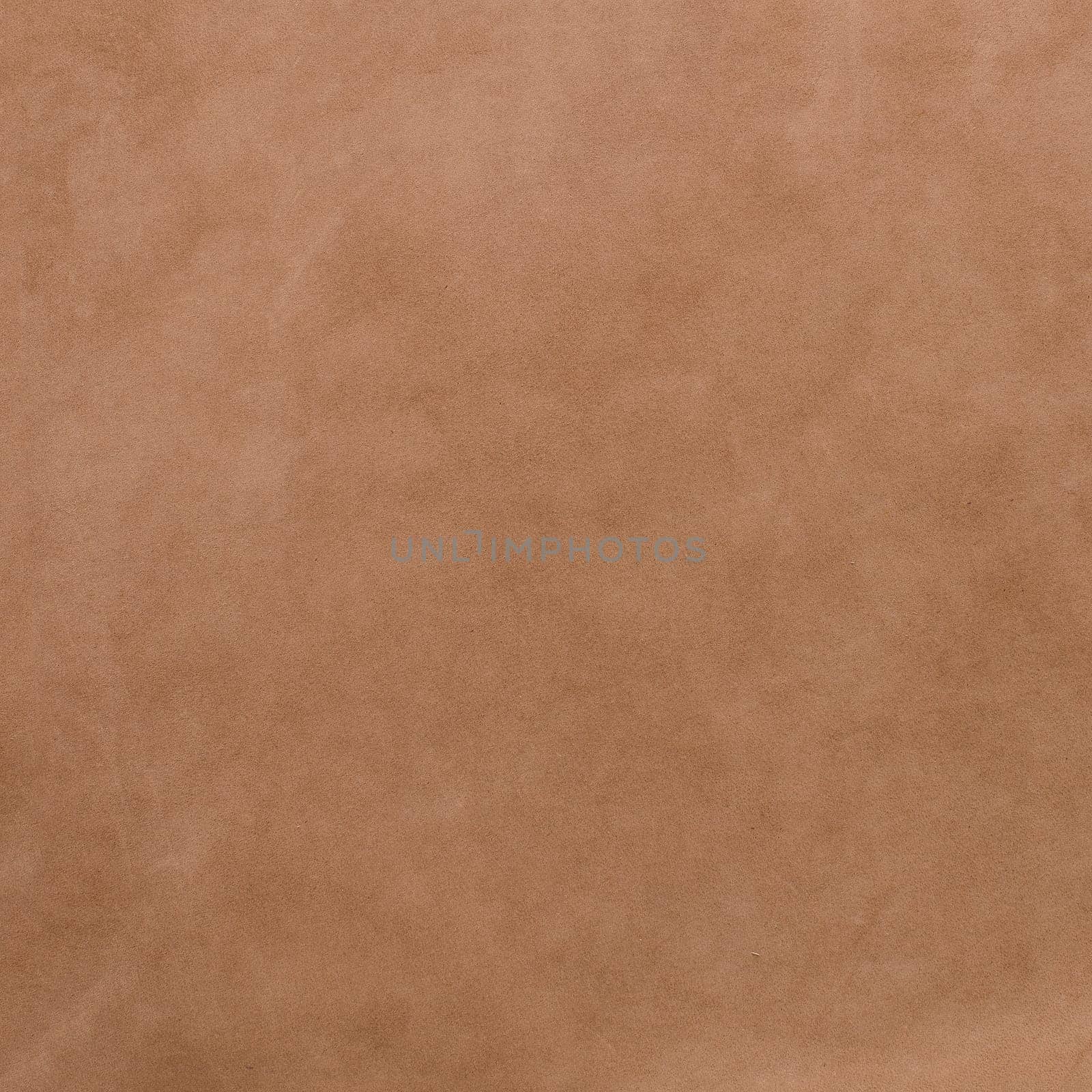 Brown leather texture closeup background.