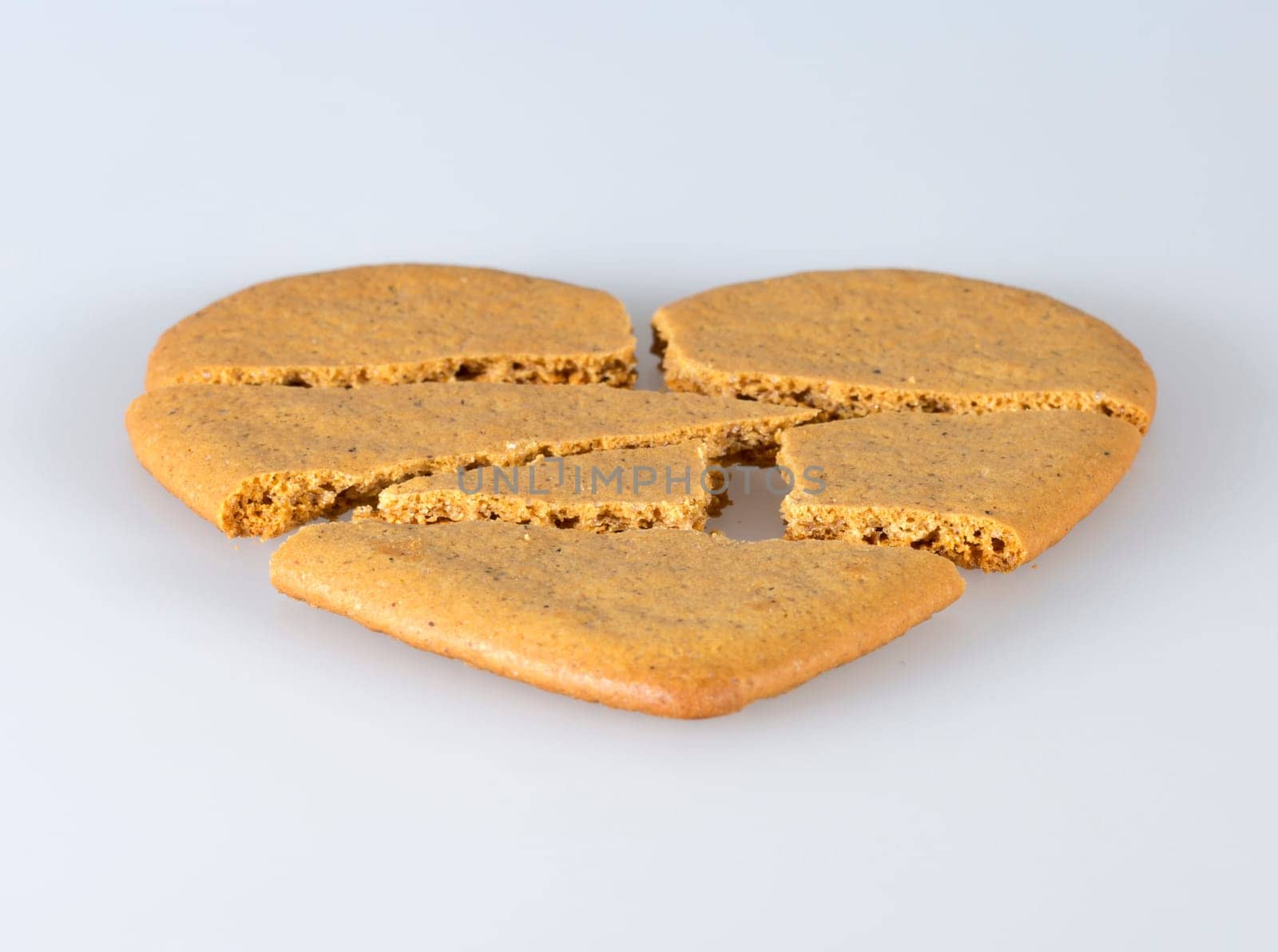 Gingerbread Heart Broken into pieces.