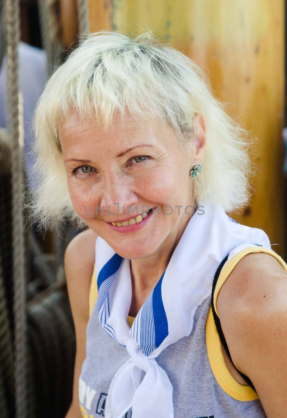 Portrait of a cheerful woman on sailboat