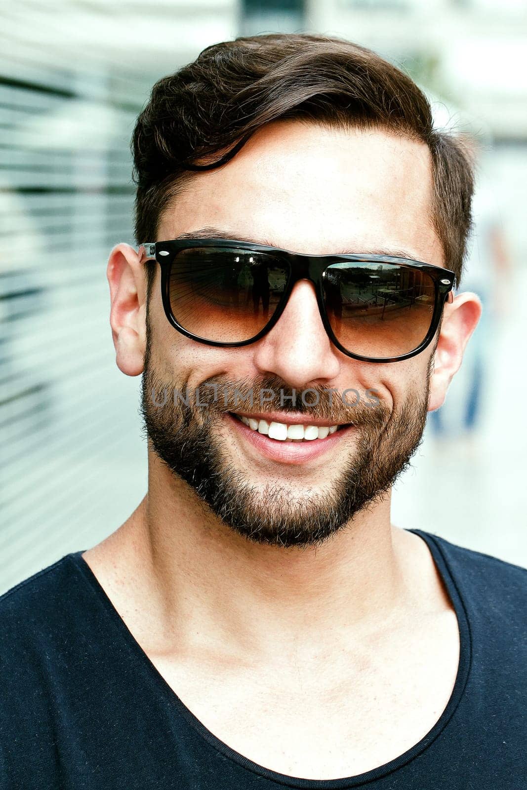 Young attractive man with sunglasses