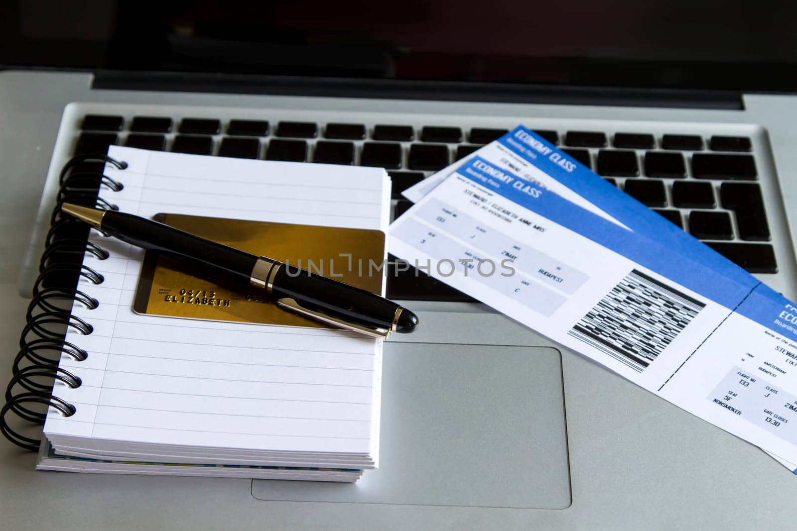 Buying airline tickets on line with a credit card.