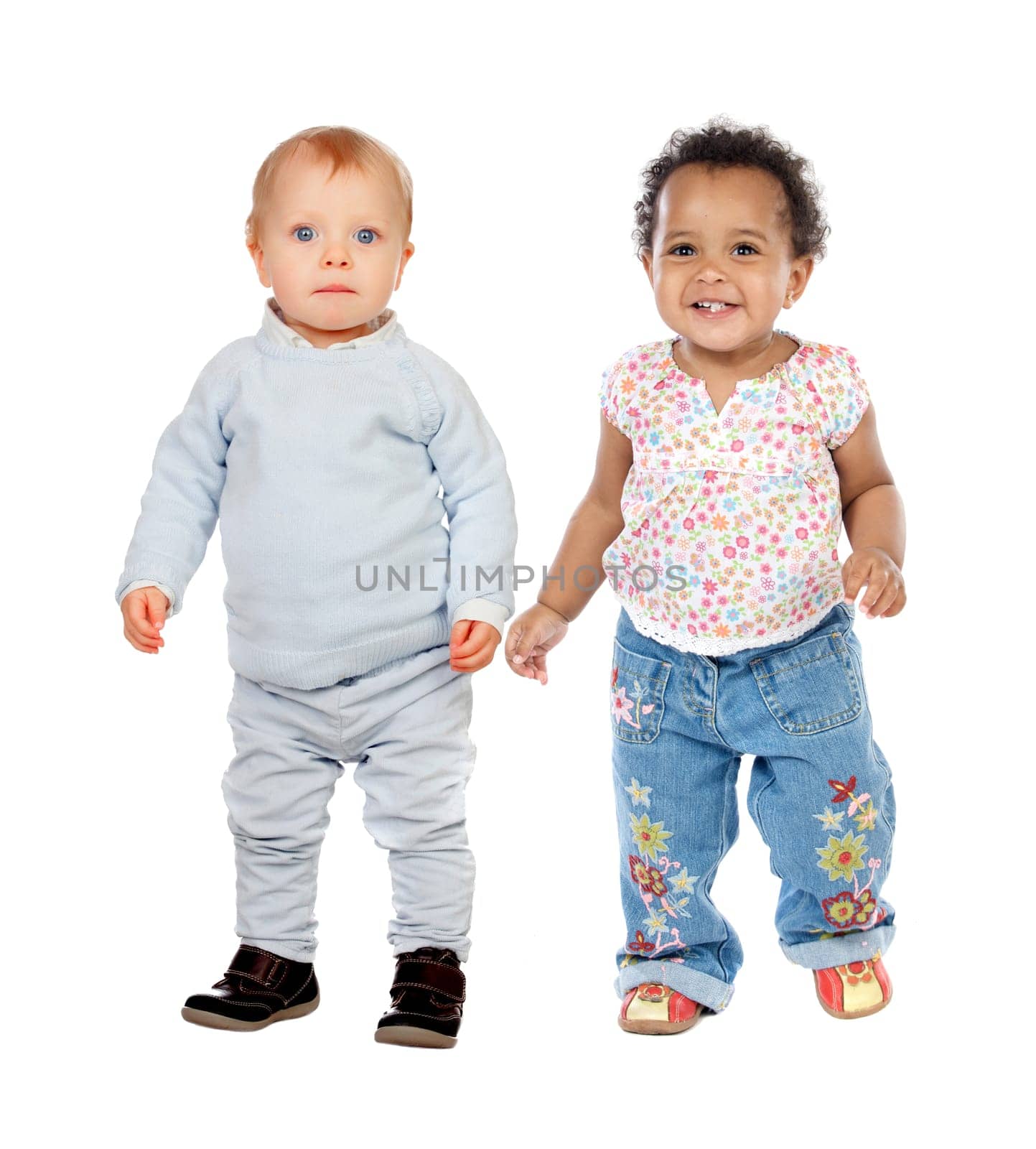 Cute babies standing isolated on white background