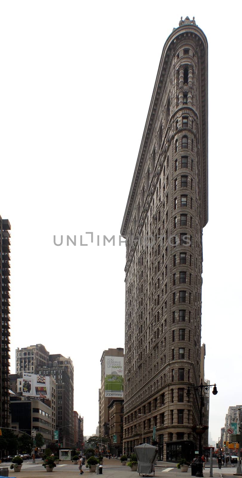 NEW YORK CITY, USA, SEPTEMBER 2013 - Historic Flat iron Building in NYC as seen on September 2, 2013. The building located between Broadway, Manhattan Fifth Ave,  built in 1902 was the first skyscrapers ever built.