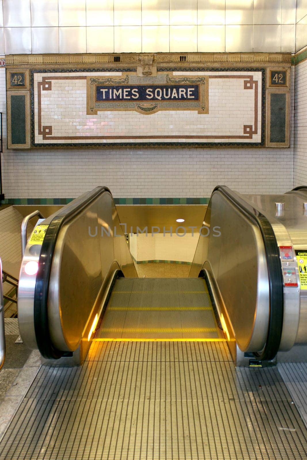 New York City Station subway Times Square sign on tile wall. The NYC Subway is one of the oldest and most extensive public transportation systems in the world, with 468 stations.