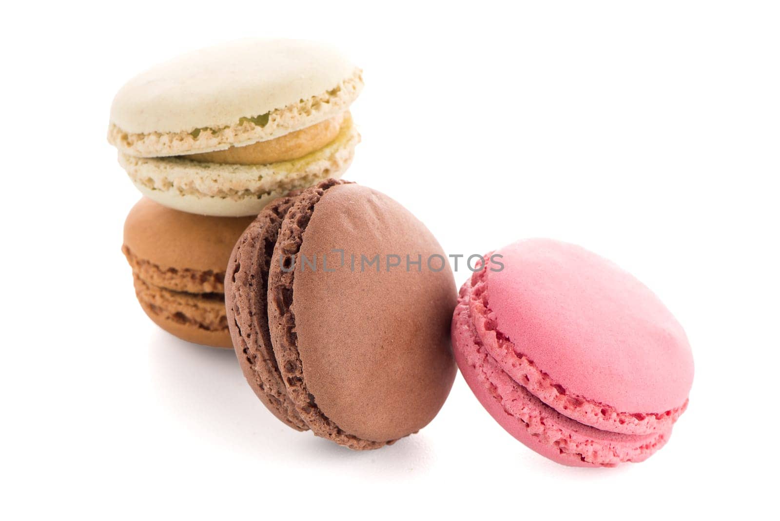 Colorful French Macarons on the white background.