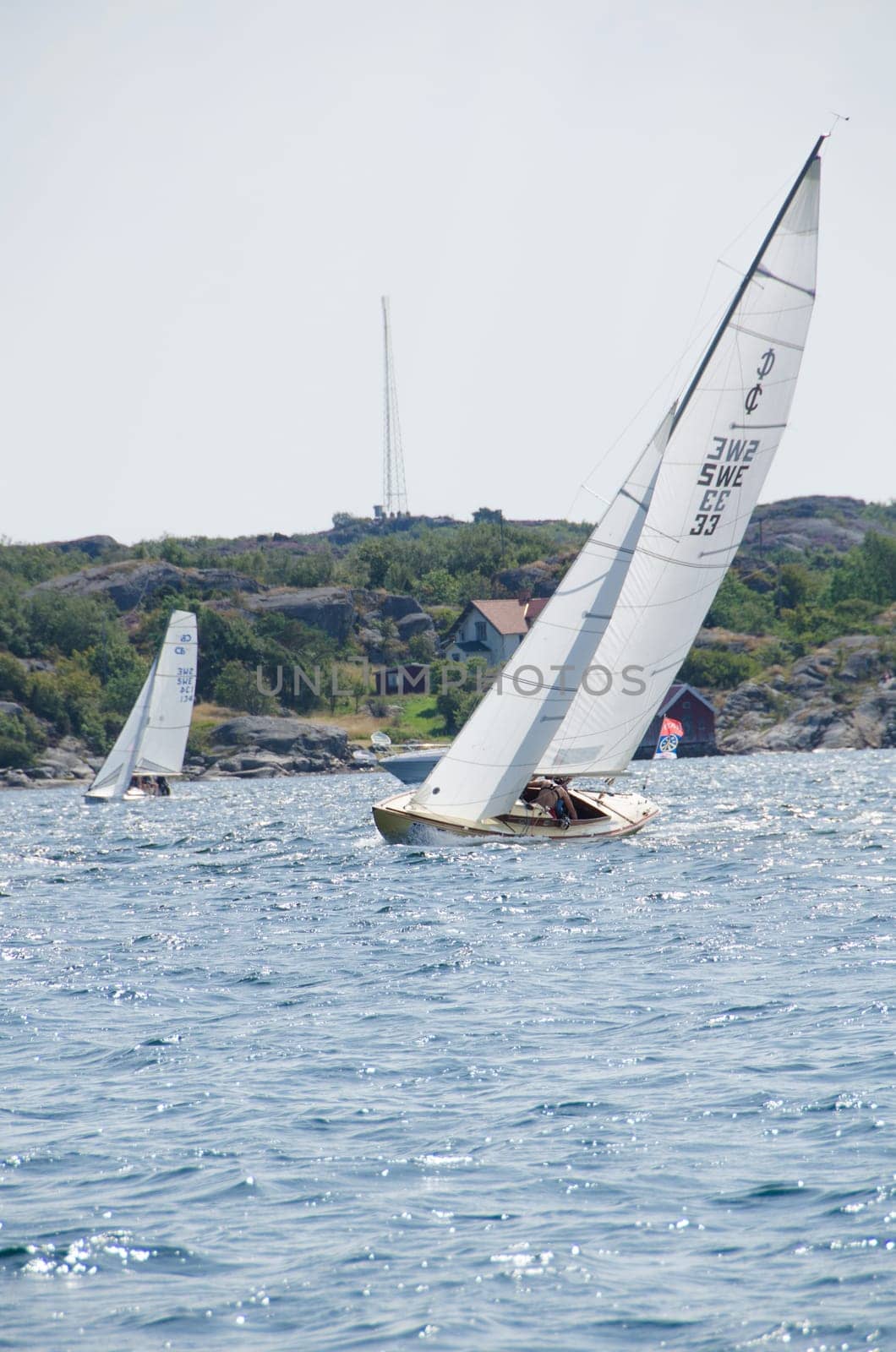 one sail competition on swedish westcoast one lonely boat