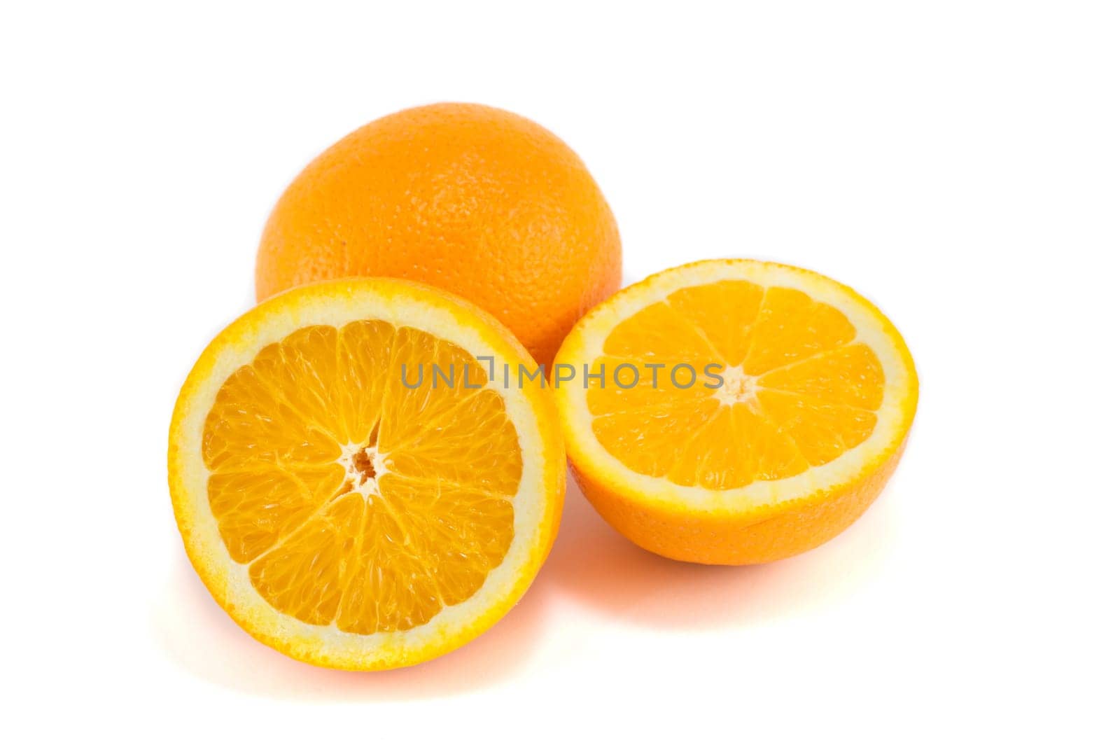 halved and whole orange isolated on white