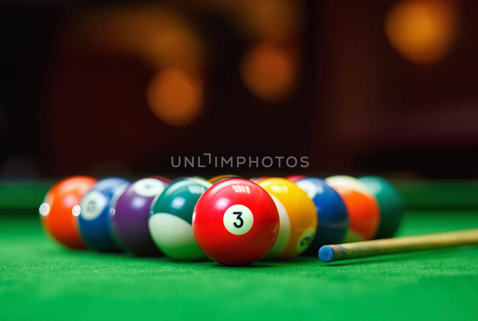 Billiard balls in a green pool table, game