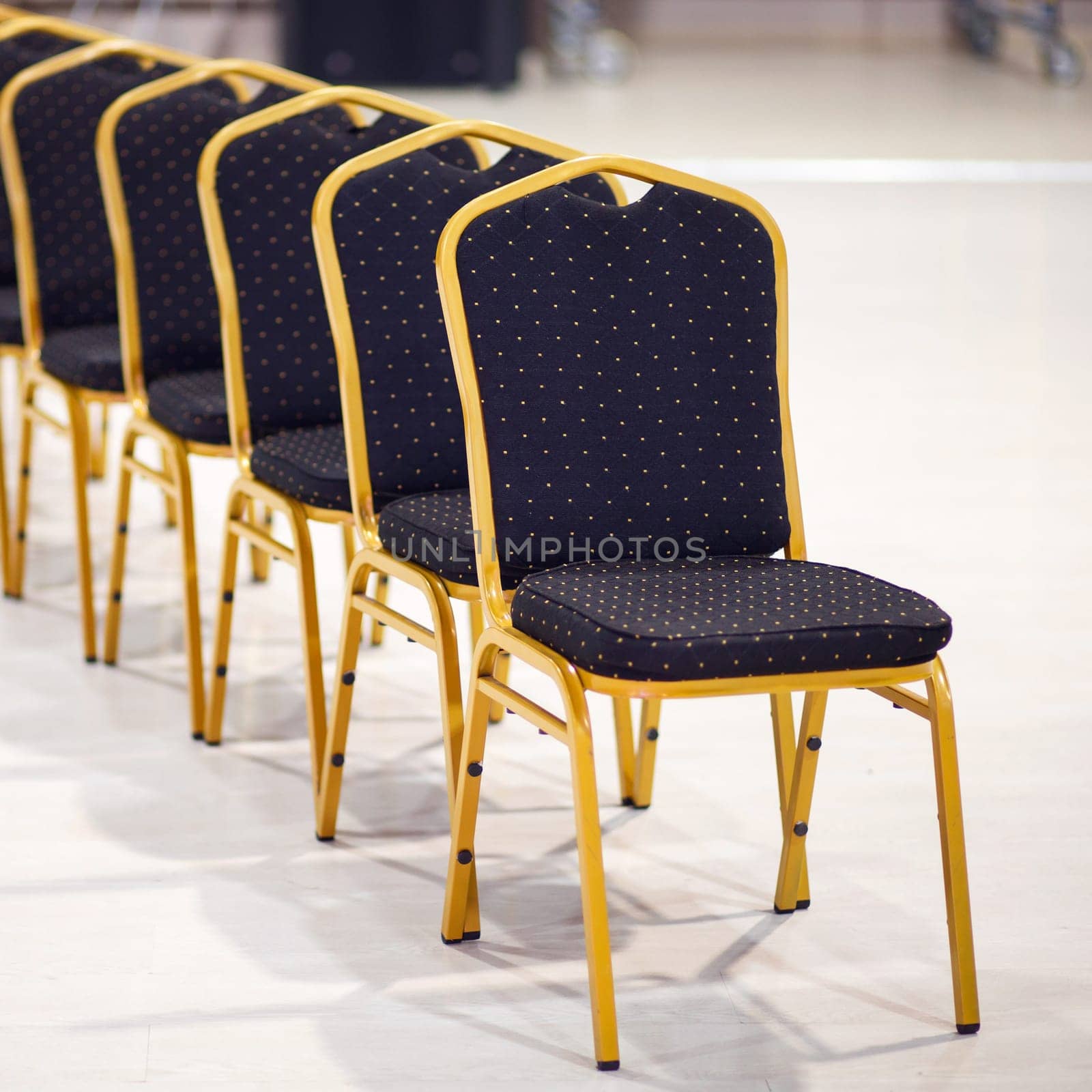 Row of chairs in office meeting room