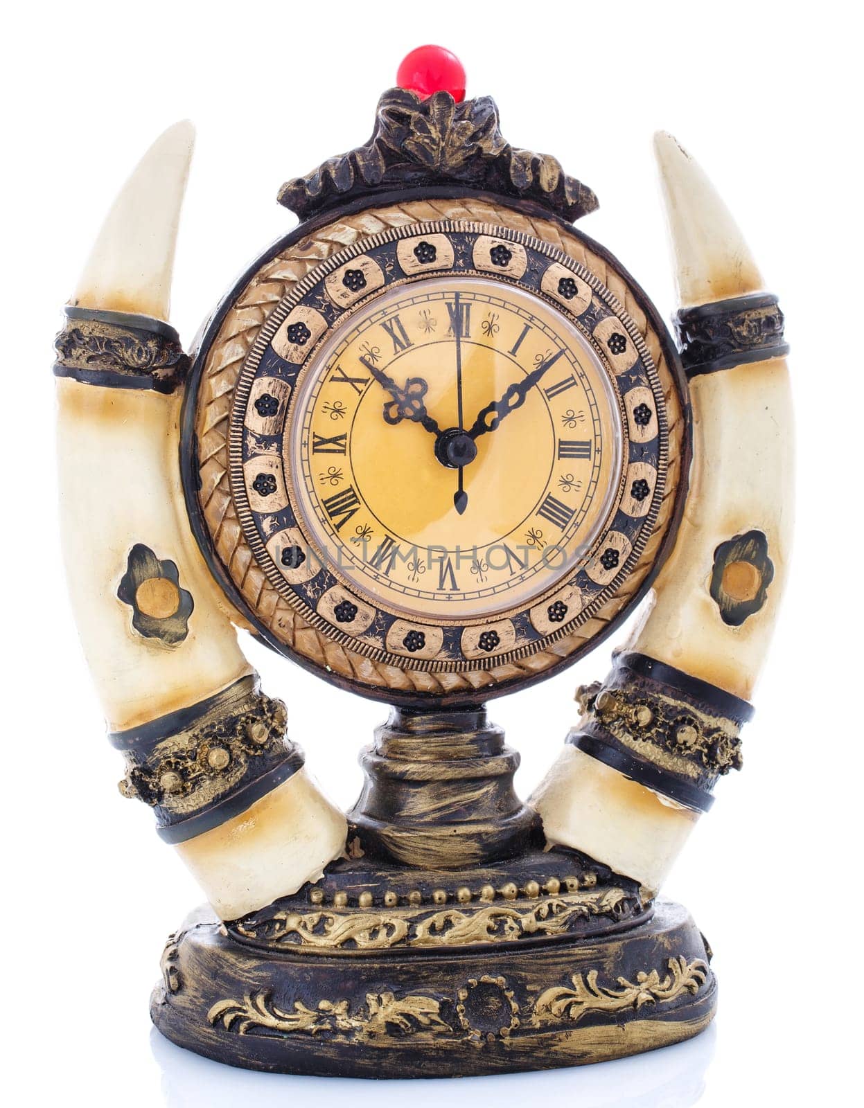 Old antique clock isolated on  white background