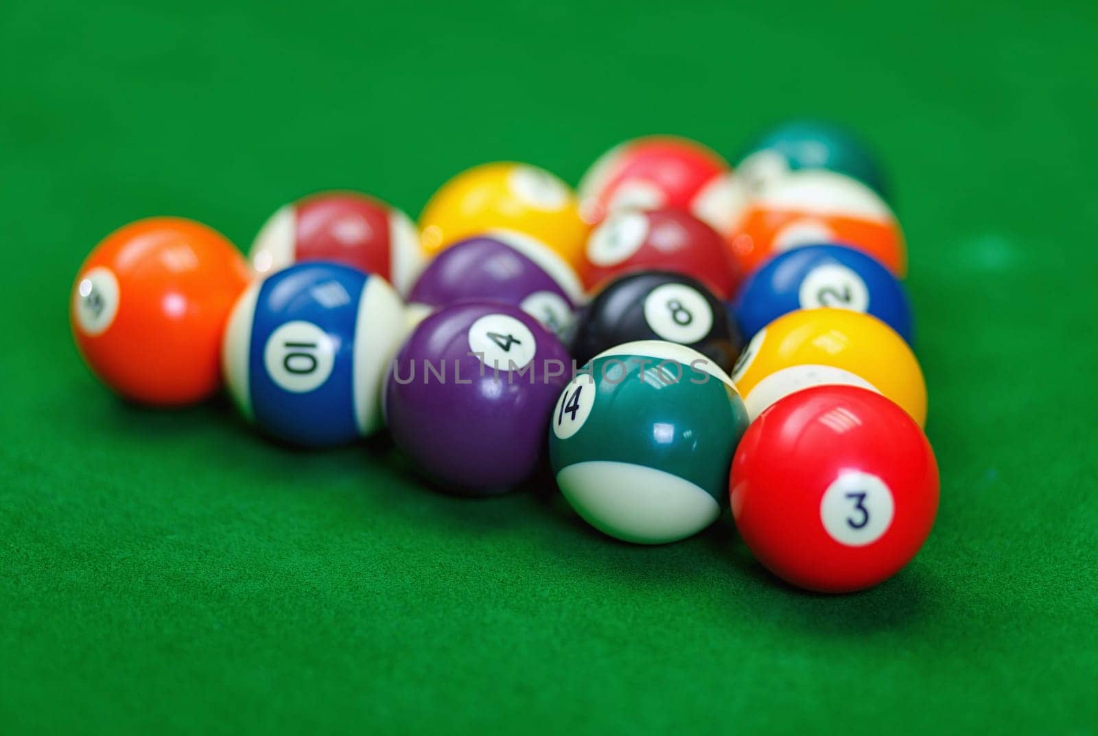 Billiard balls in a green pool table, game