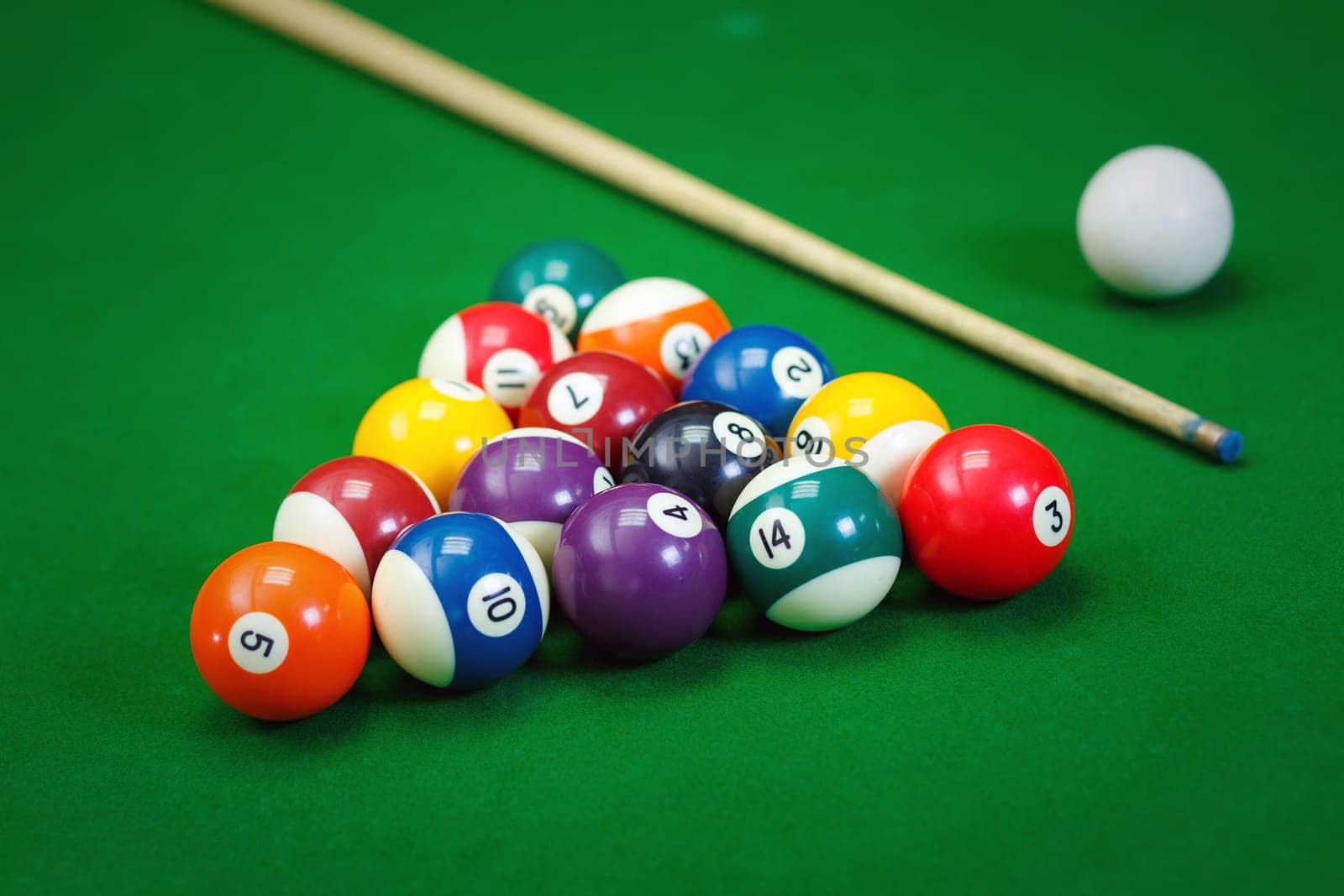 Billiard balls in a green pool table, game