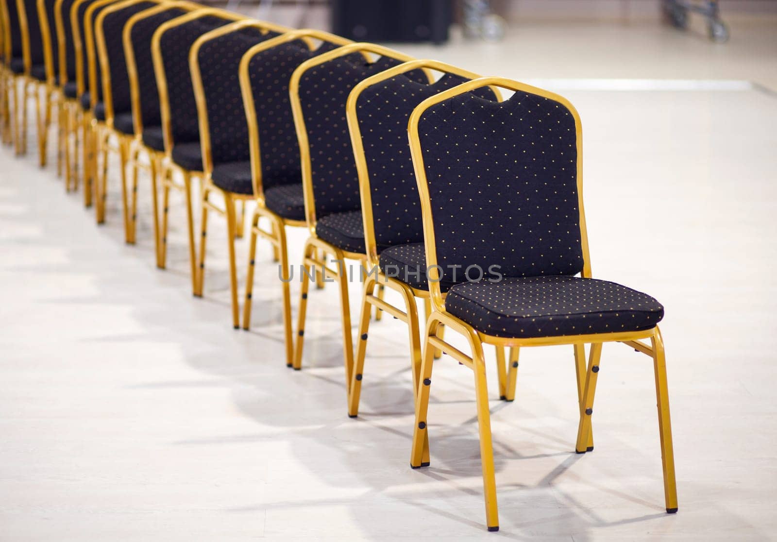 Row of chairs in office meeting room