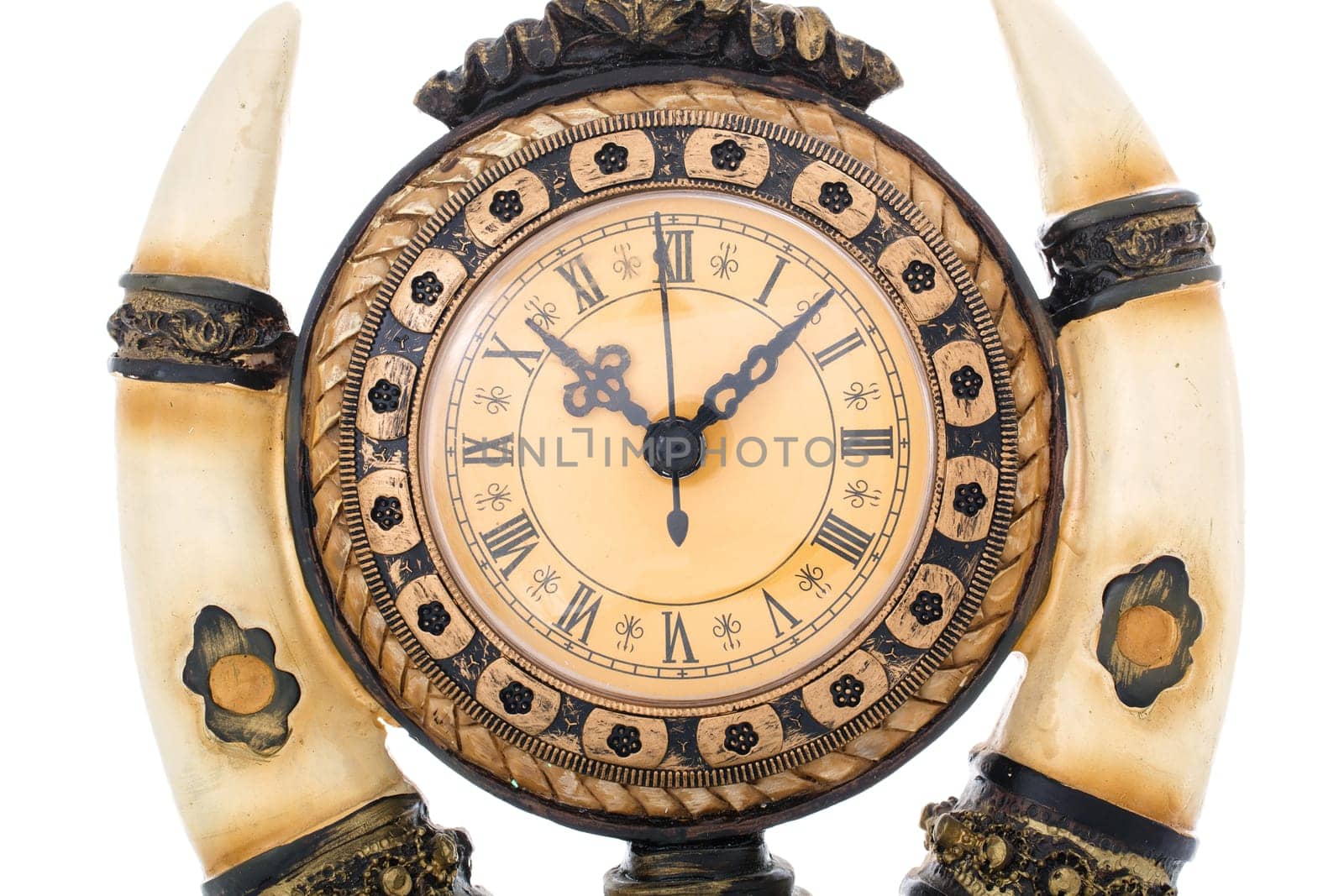 Old antique clock isolated on  white background