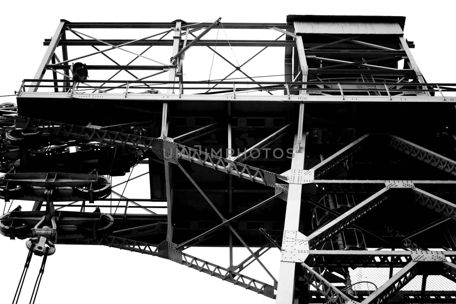 A high voltage tower from a steel frame with cable winch platforms.