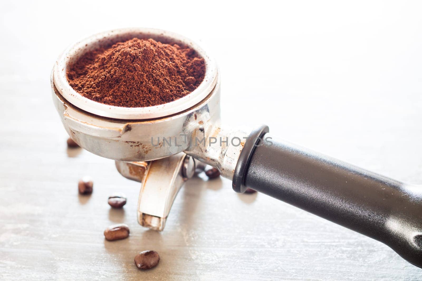 Coffee grind in group with coffee bean, stock photo