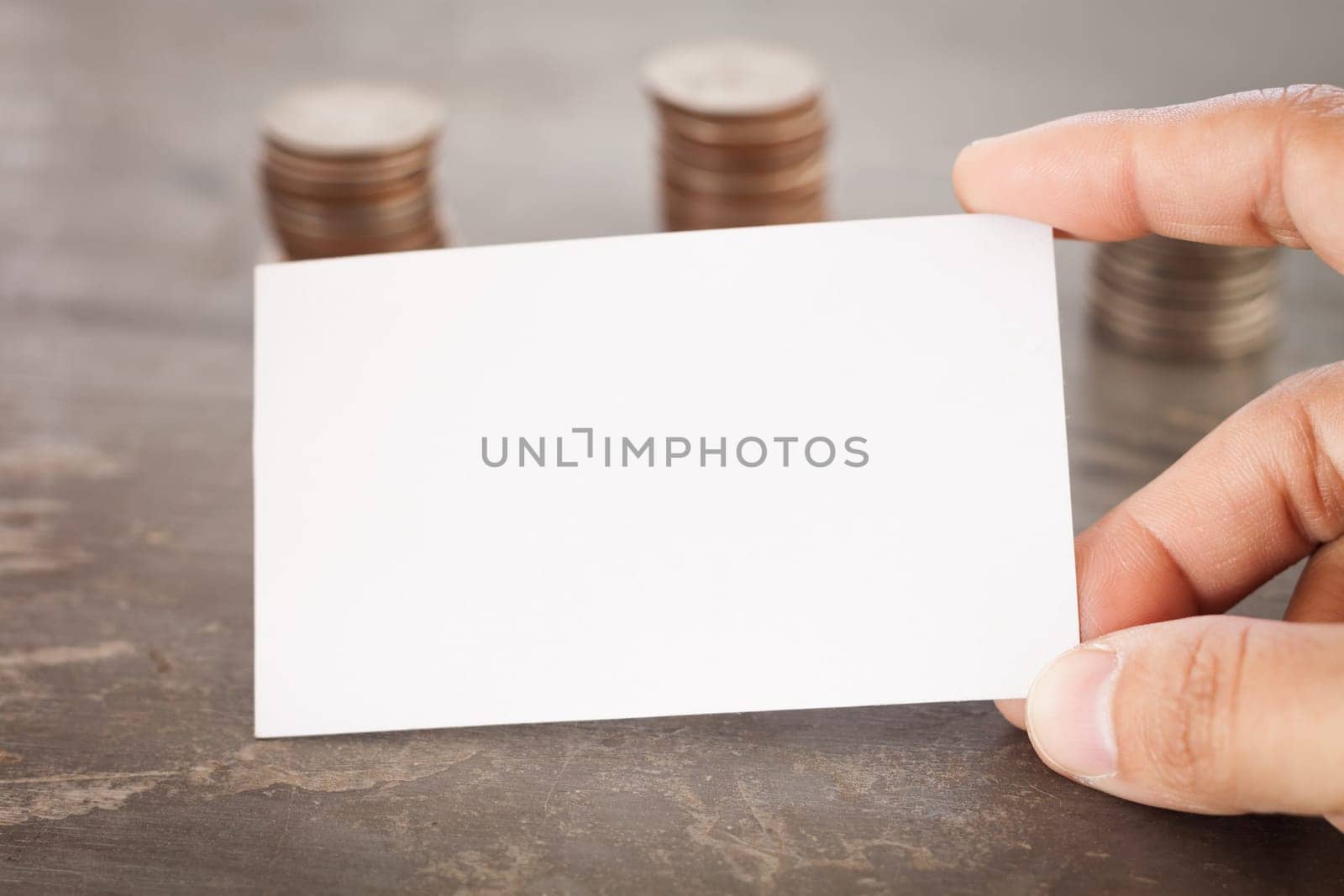 Blank name card with coins, stock photo