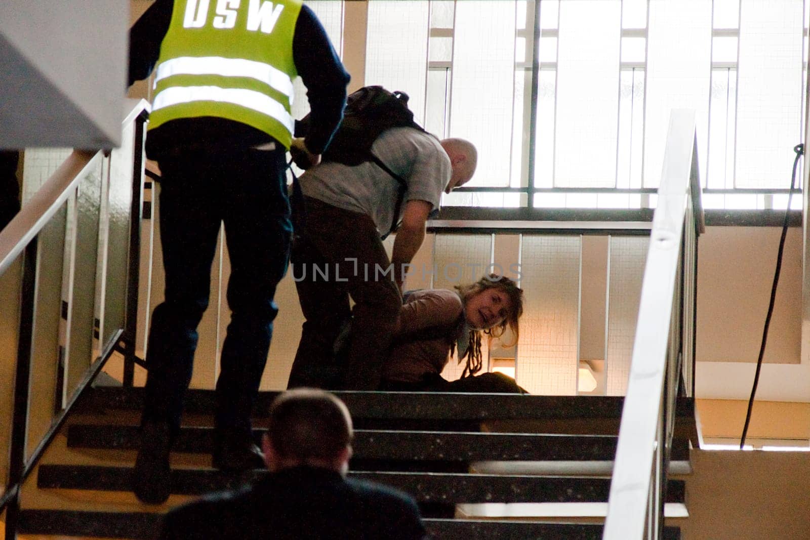 Activists (Against the closure of the THF ) disrupt the 60th anniversary of the airlift celebration in Berlin-Tempelhof with a poster in the evening and are taken into security custody by security personnel and taken away.